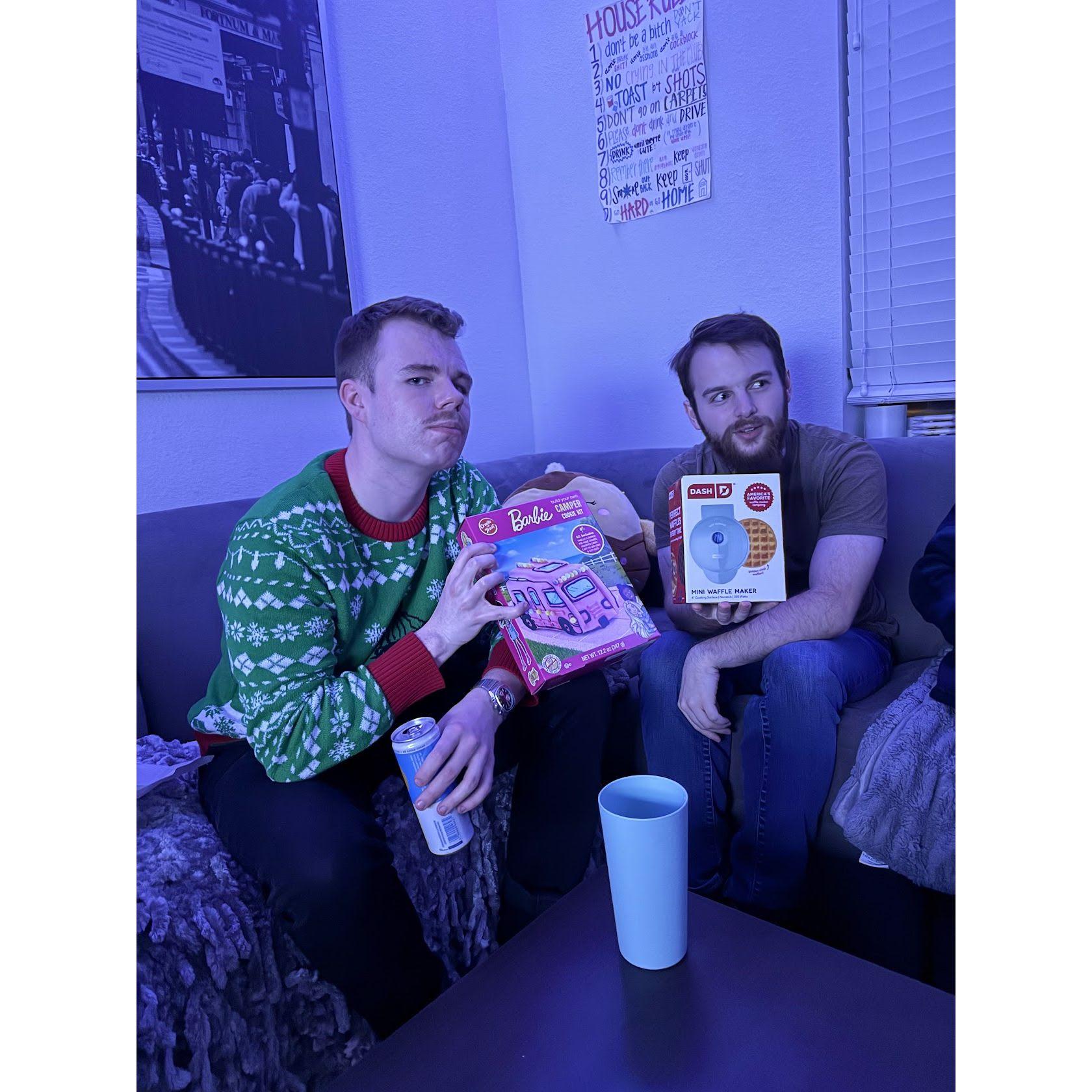 Zach and Tom sharing laughs and surprises with their Secret Santa gifts! 🎁😂✨