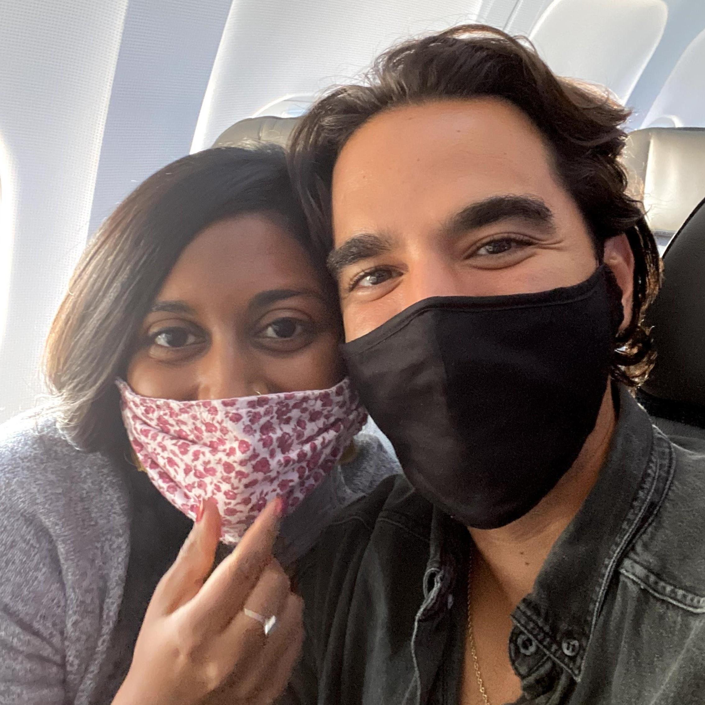 Planes in a Pandemic. On our way to get engaged. Ash has no idea in this photo.