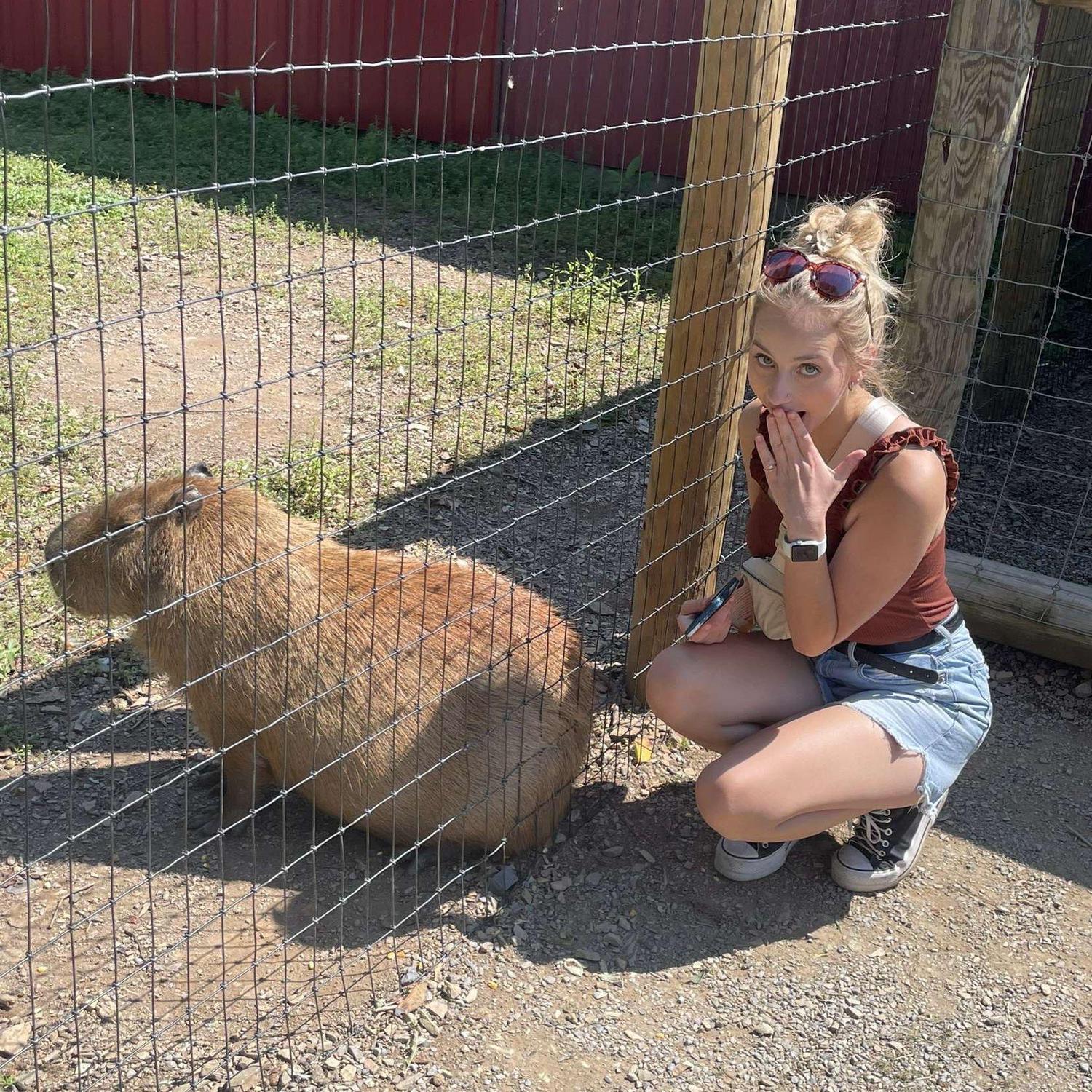 Photo of Brooke at Lake Tobias! Capybaras are her favorite animal!