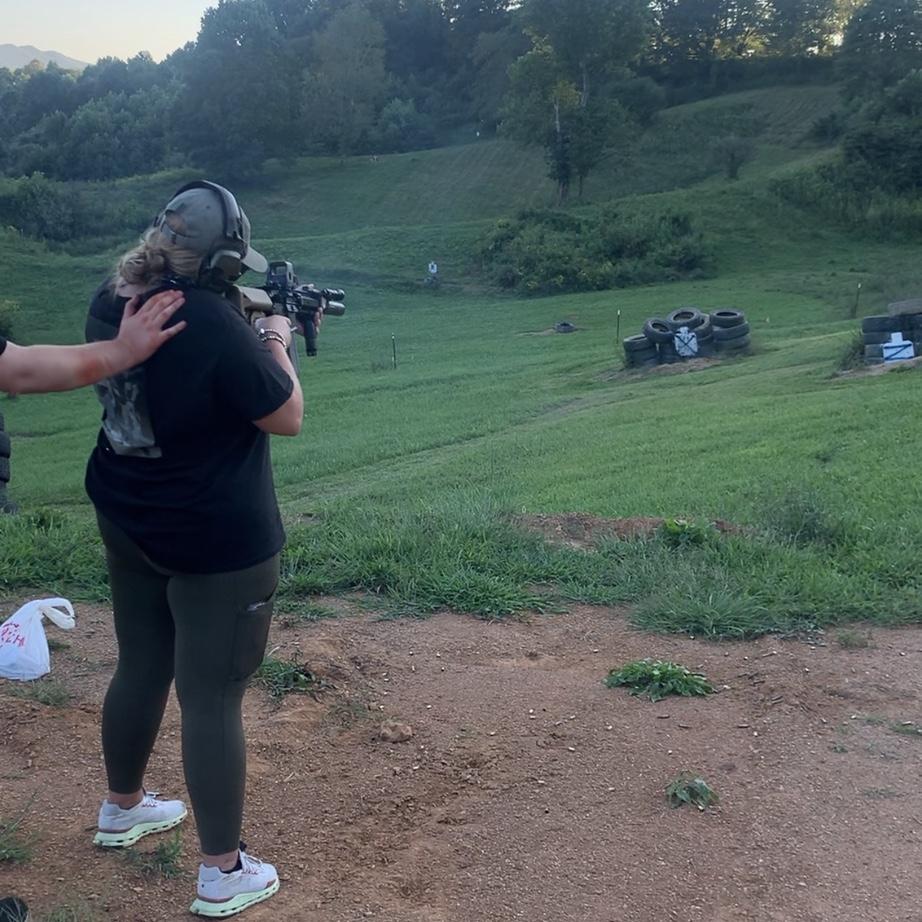 Trying to teach Jac the proper way to shoot a gun. Always.