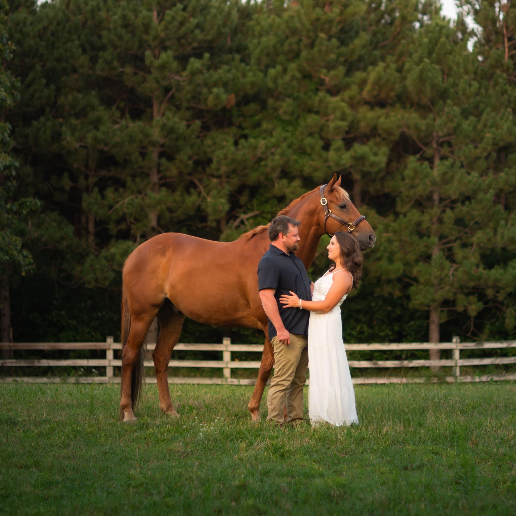 Jon, Cassidy, and Yogi in the "Big Pasture" during their engagement shoot (that they photographed themselves).