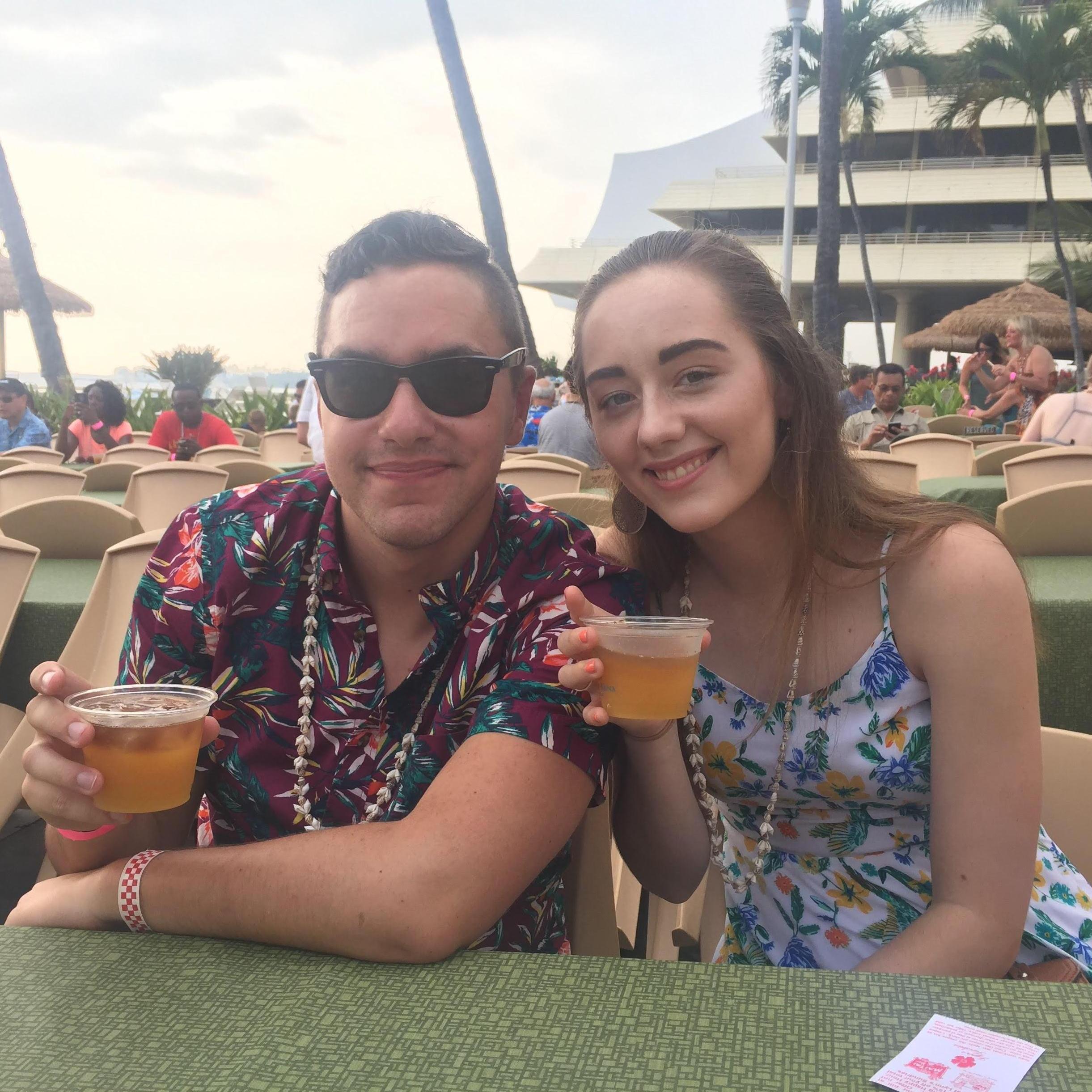 After graduating, we went with Sam's family to Hawaii! We didn't match each other, but Sam did match another random couple at the luau. They invited Sam to join their group but he declined!