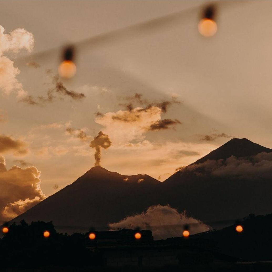 Rooftop Sunset from Antigua - Looking at Volcan de Fuego and Volcan Acatenango