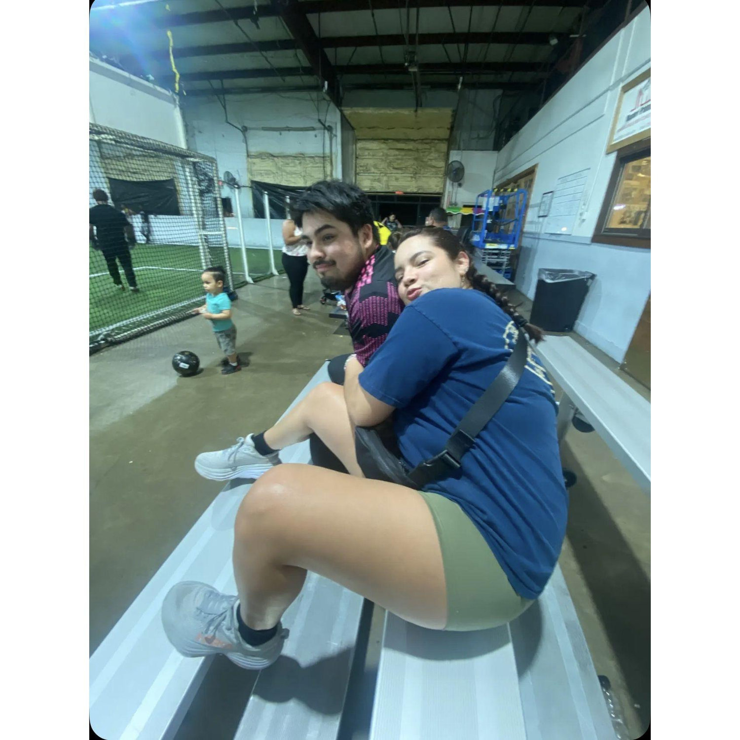 Getting close to a year together: Eric and his number one fan at his soccer game.