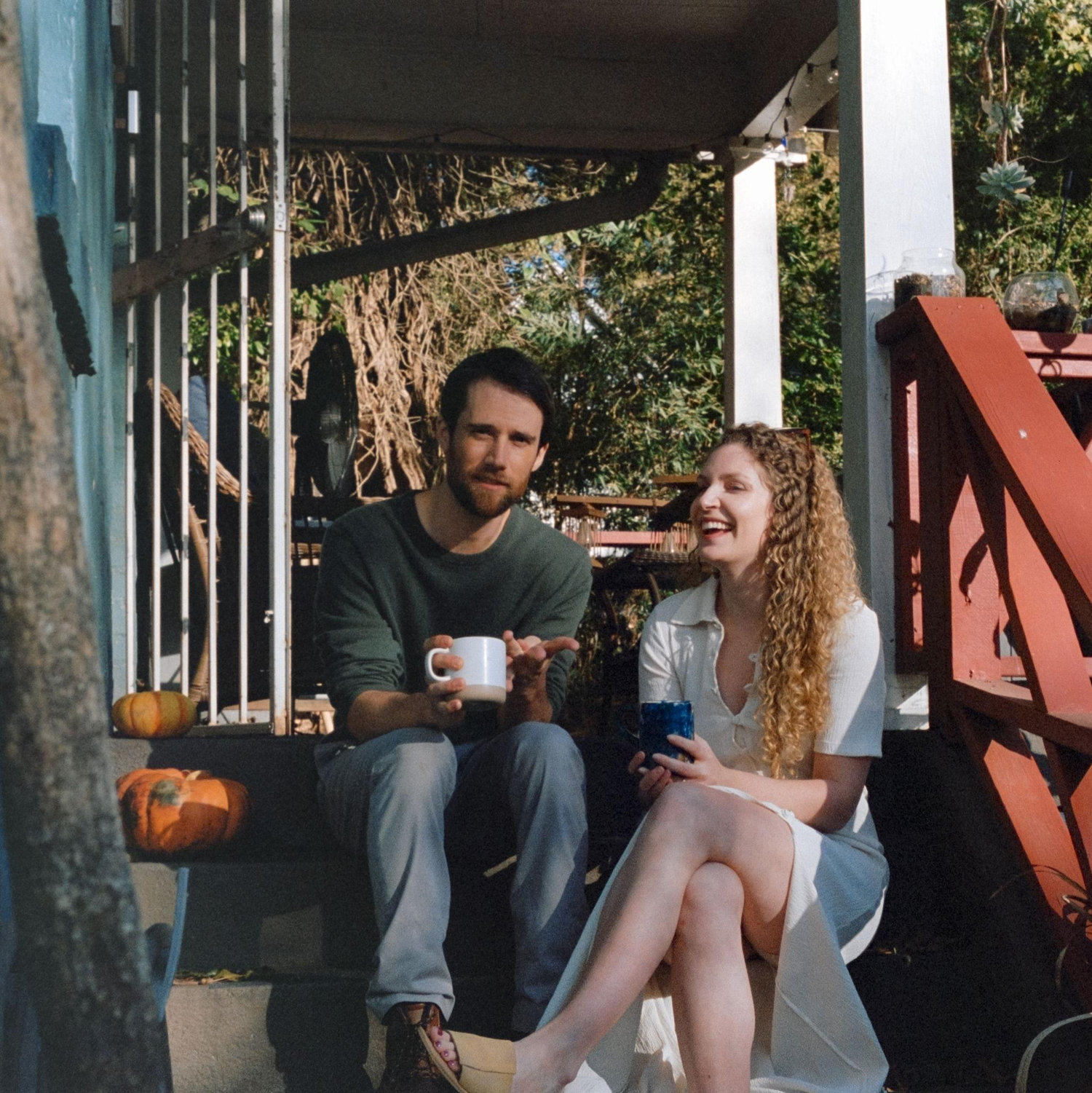 This is the first photo of our engagement photoshoot with our friend, Anna. We sipped a bit of coffee on the steps of our front porch and then went on a little walkabout throughout our neighborhood.