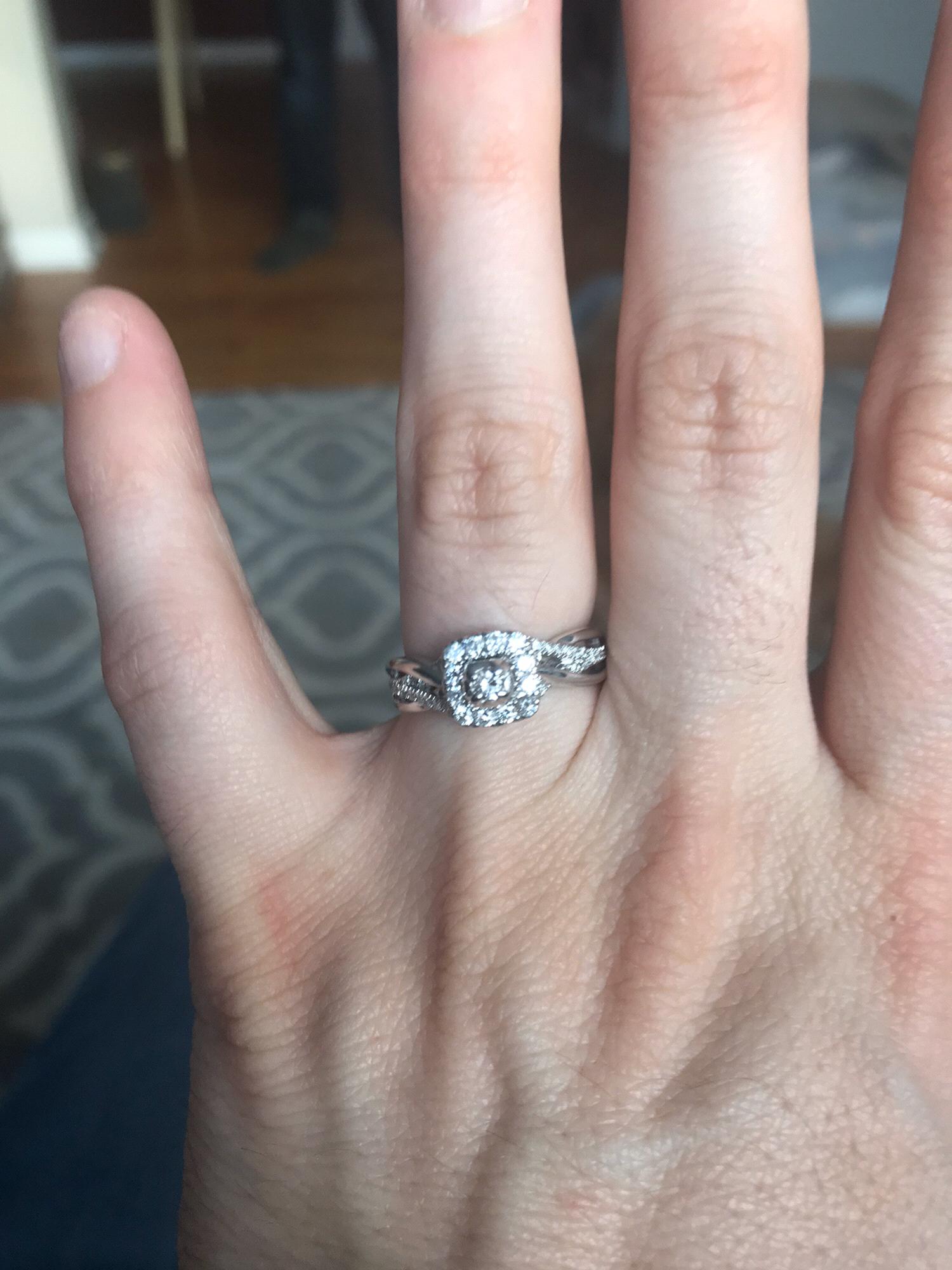 The ring! The diamond in the center is the diamond that the grooms father, Bob Draper, gave to his late mother, Deborah Truer for their engagement! We made it our own!