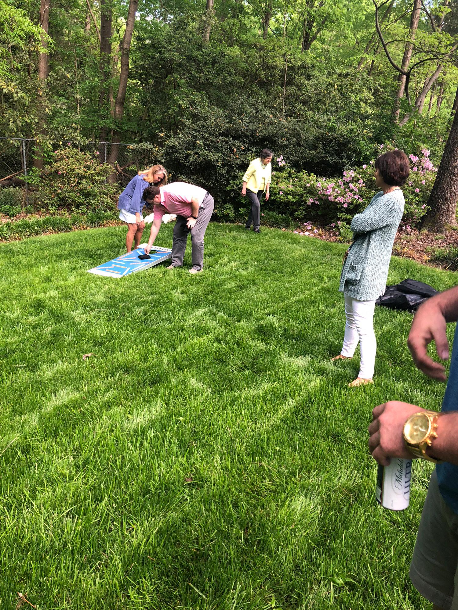 Easter Day corn hole tournament at Aunt Wendy and Uncle Duane's house. Hunter and her partner were the champions!