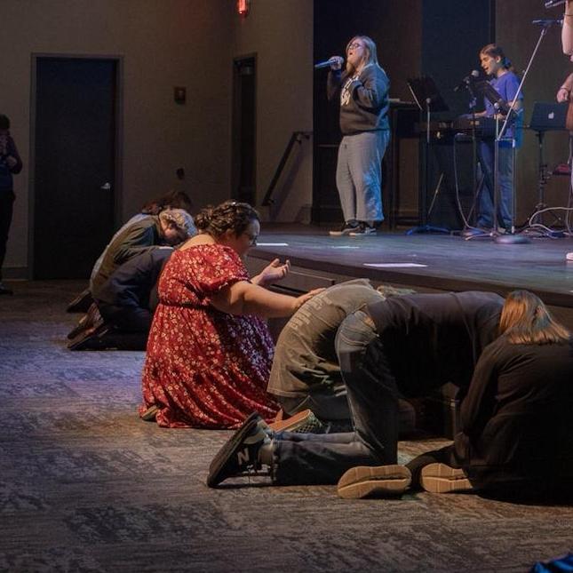 This is a favorite photo of Carrianna's. She thinks it is such a great honor that God set her apart to be Josh's helper, and one of her favorite ways to support him is by praying for/with him.