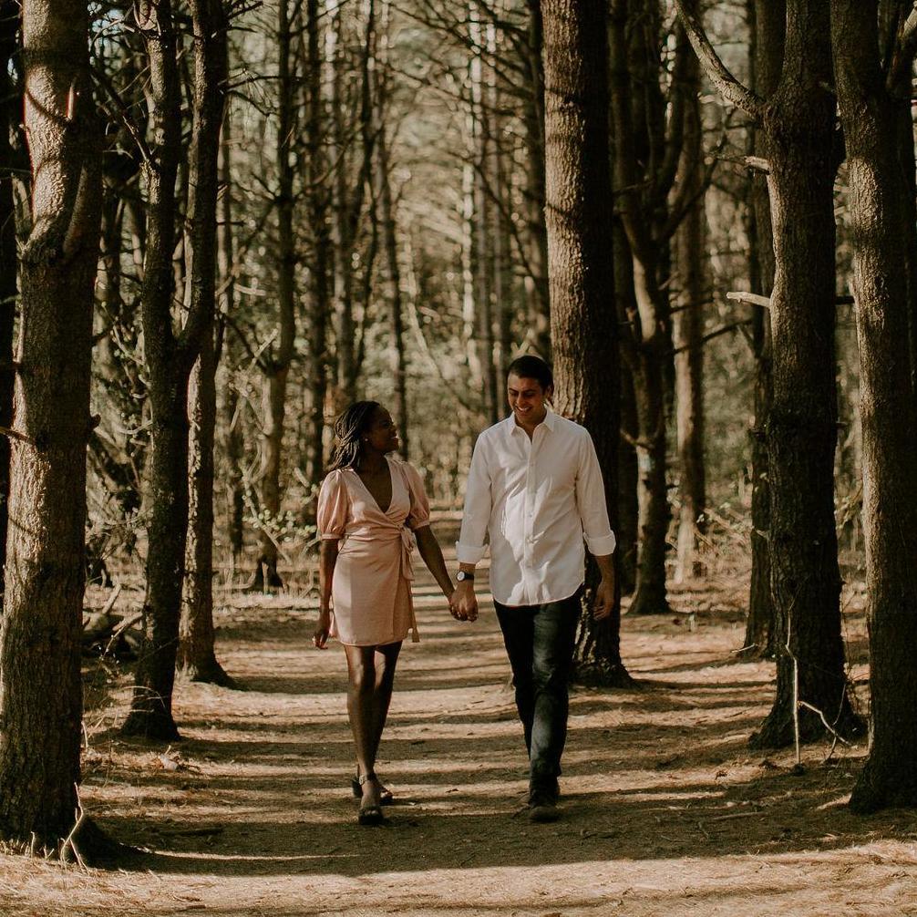 Danielle and Alex walking down the path to forever, in Kalamazoo, Michigan.