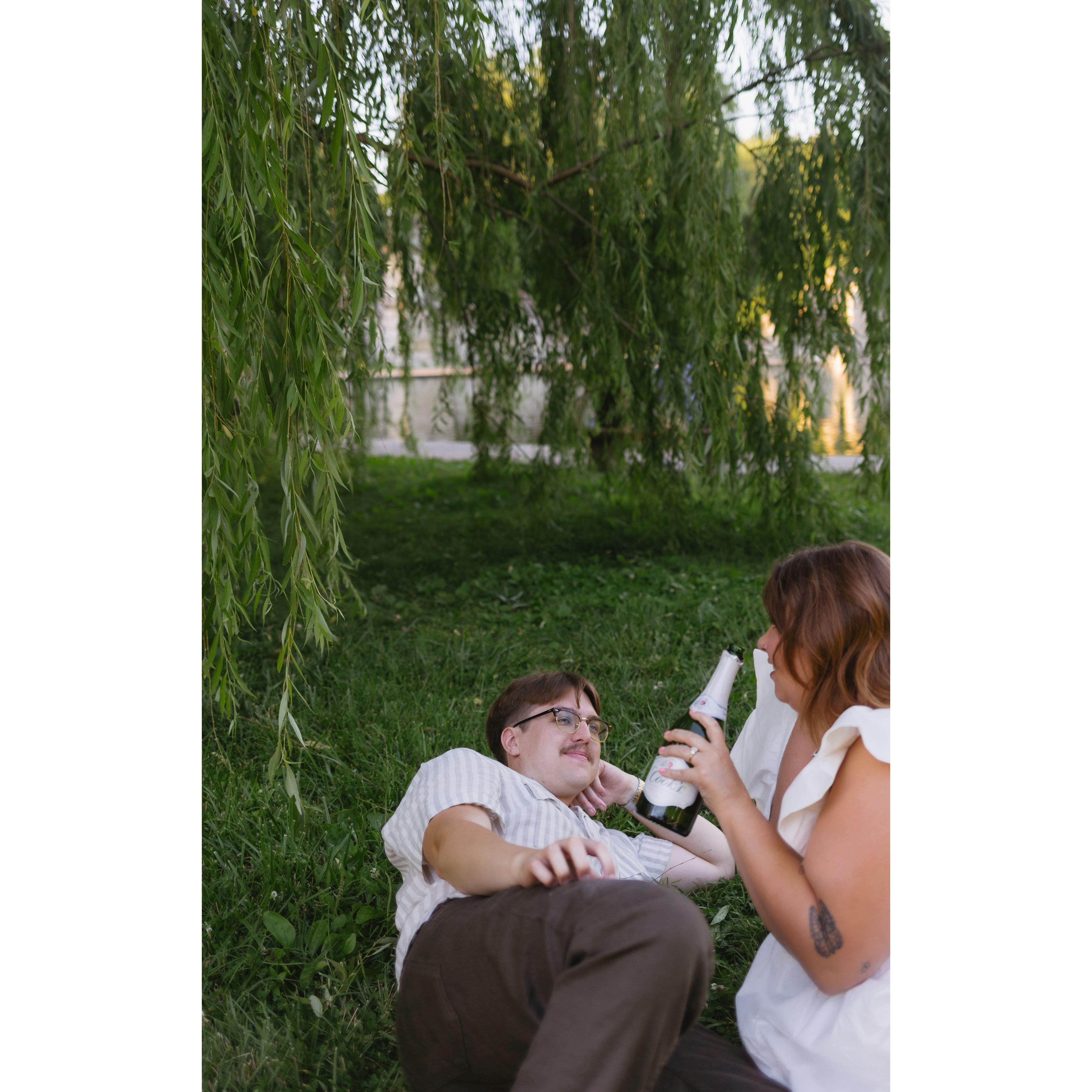 Enjoying a sip of champagne as we were trying to decide our next pose for our engagement pics