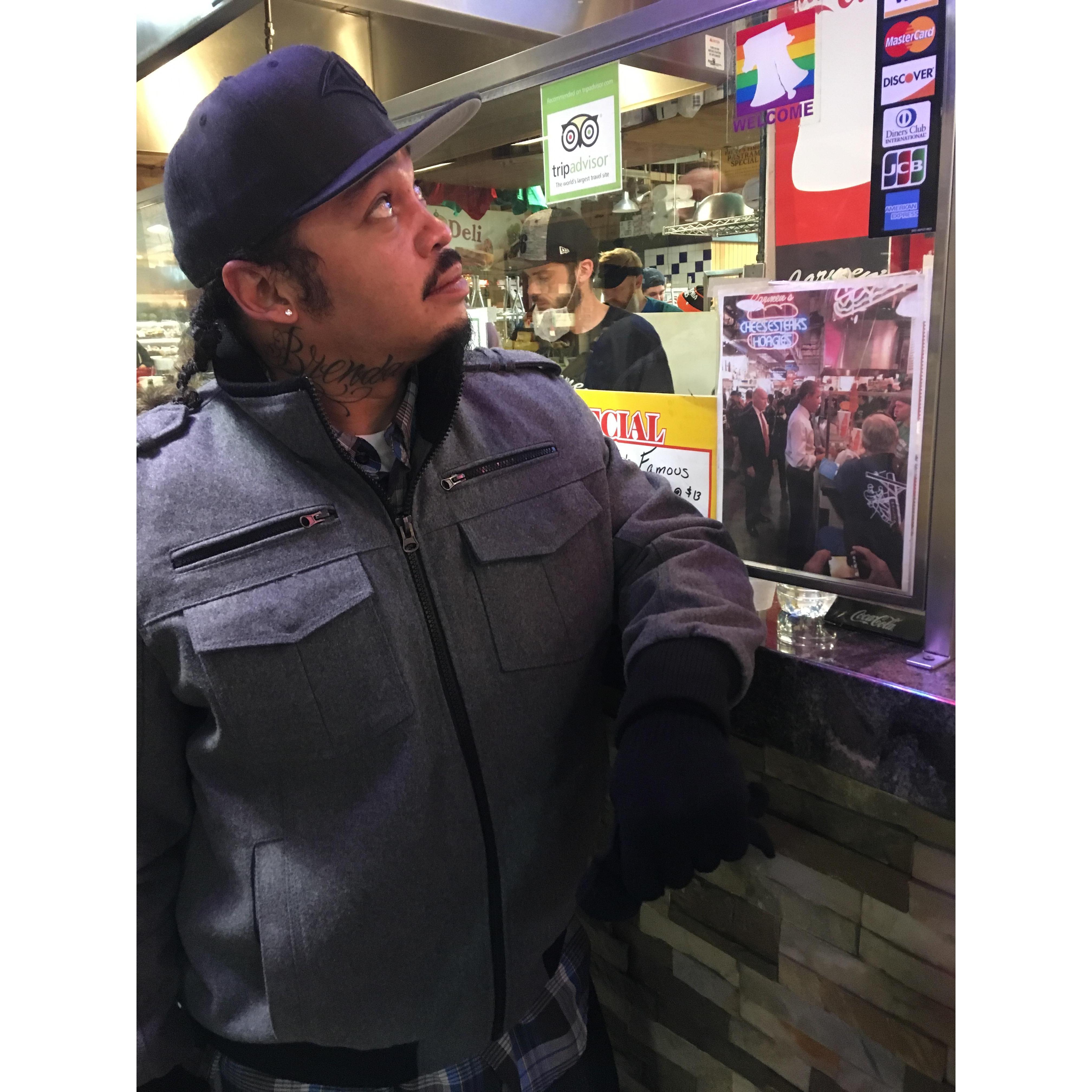 Elias trying out Philly Cheesesteaks during his visit in 2017. Wait is that the president?!