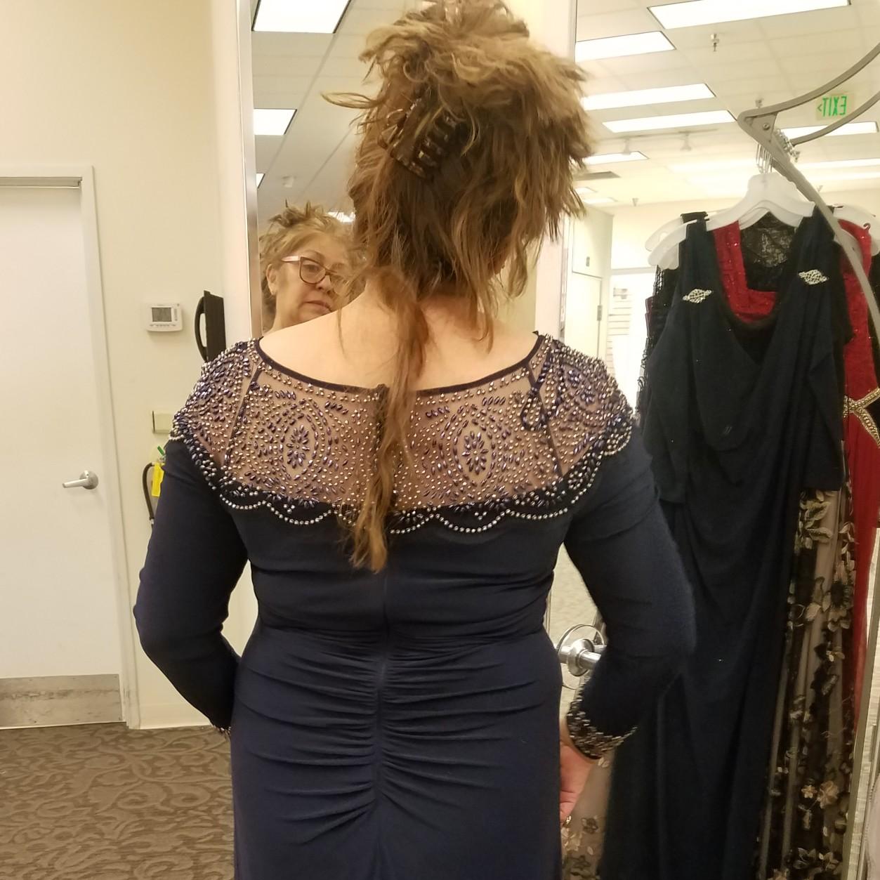 Mom trying on dresses
