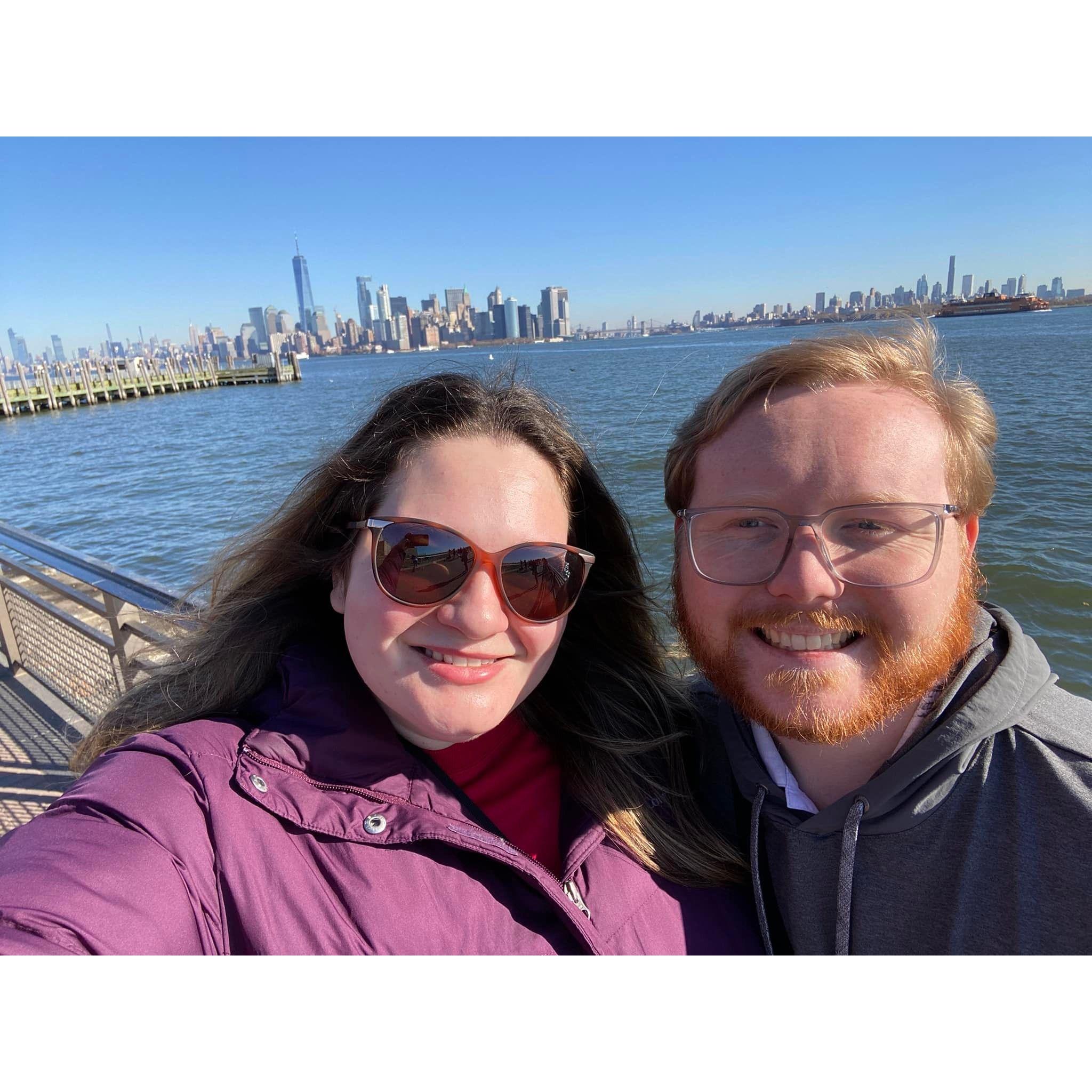 Selfie in front of the Manhattan skyline.