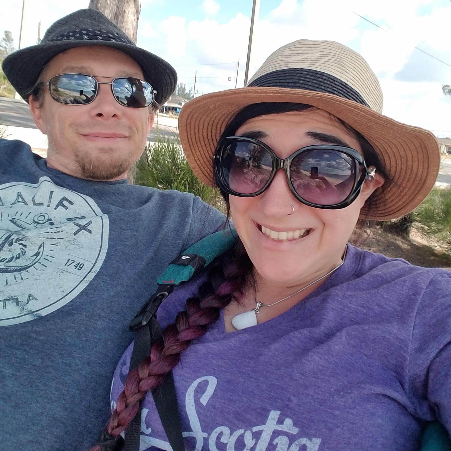 Both wearing our t-shirts from Canada in the Bahamas :)