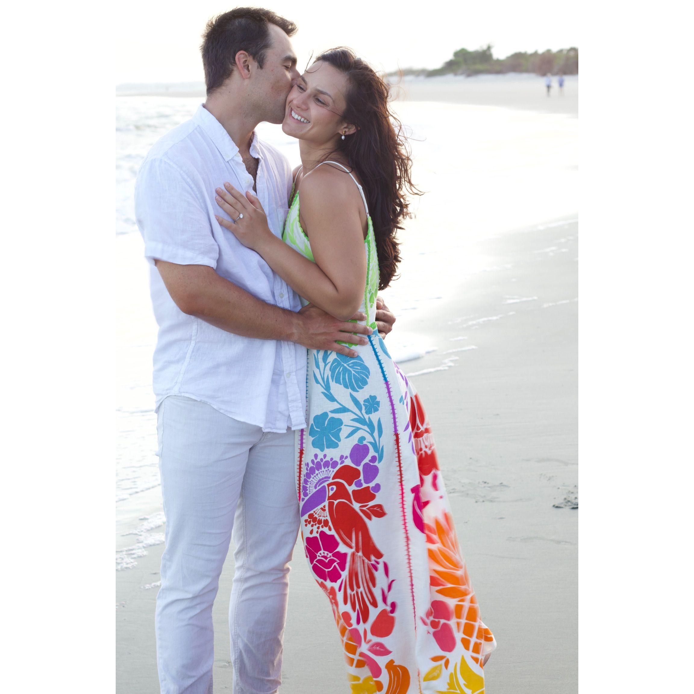 Our friend, Hannah Pressler, took engagement photos of us on Sullivan's beach! We used our save the date picture from this session!