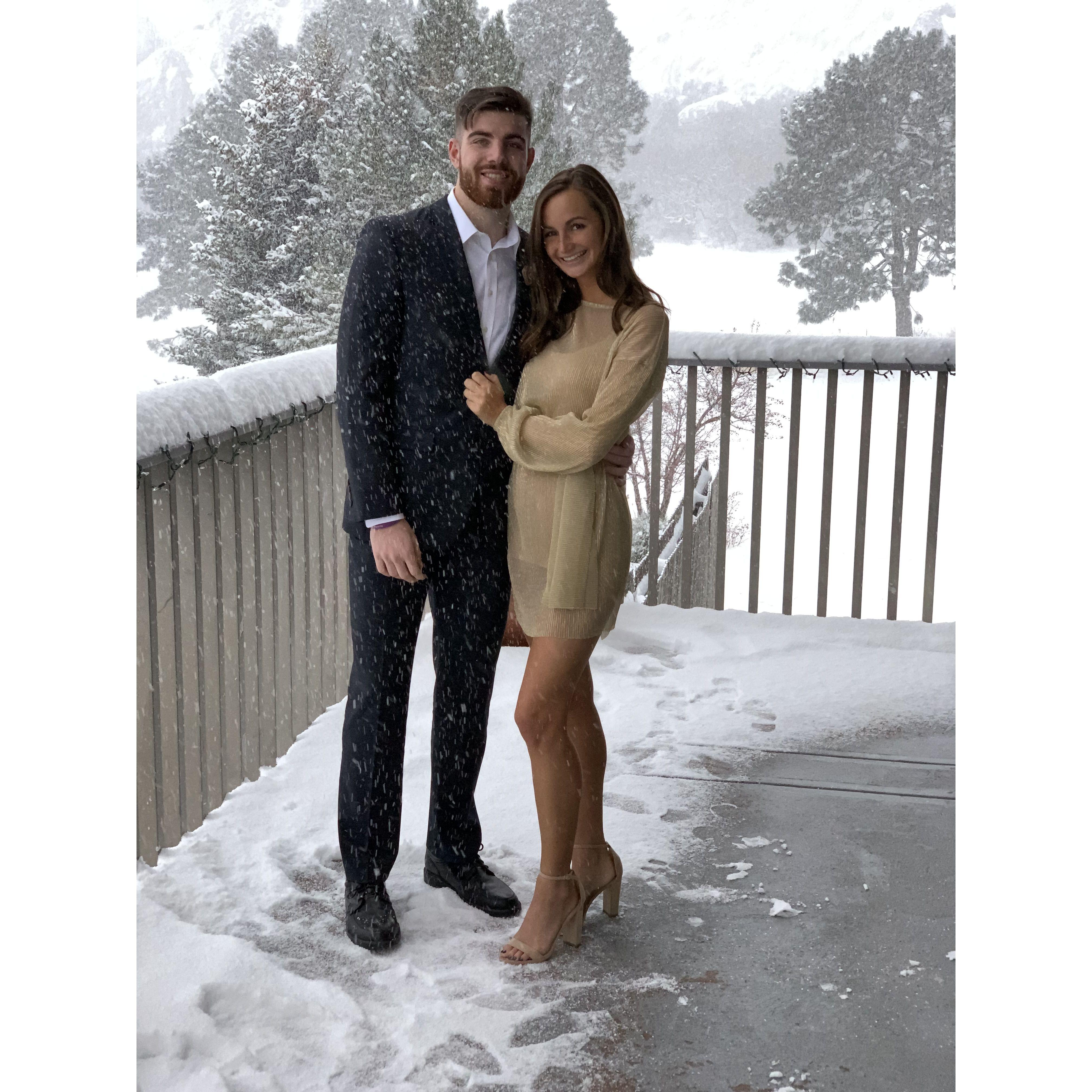 Posing in snowy mountains celebrating Harry & Lori