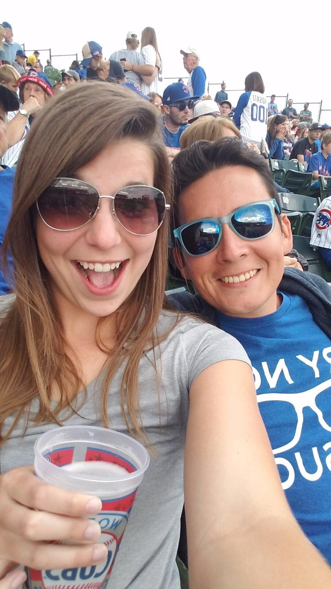 The first picture we ever took together! Our second date at a Cubbies game!