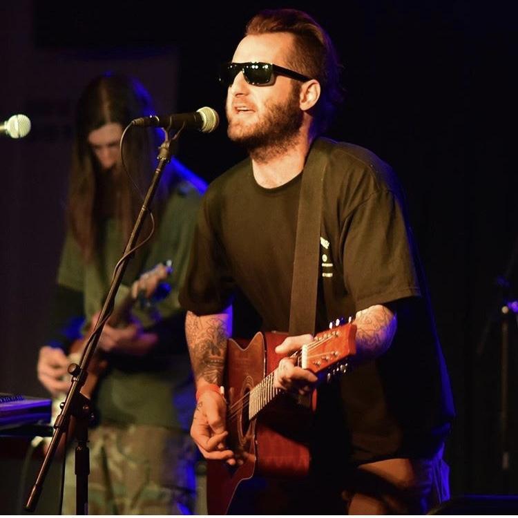 Joey (with cousin Pete) doing what he loves most!