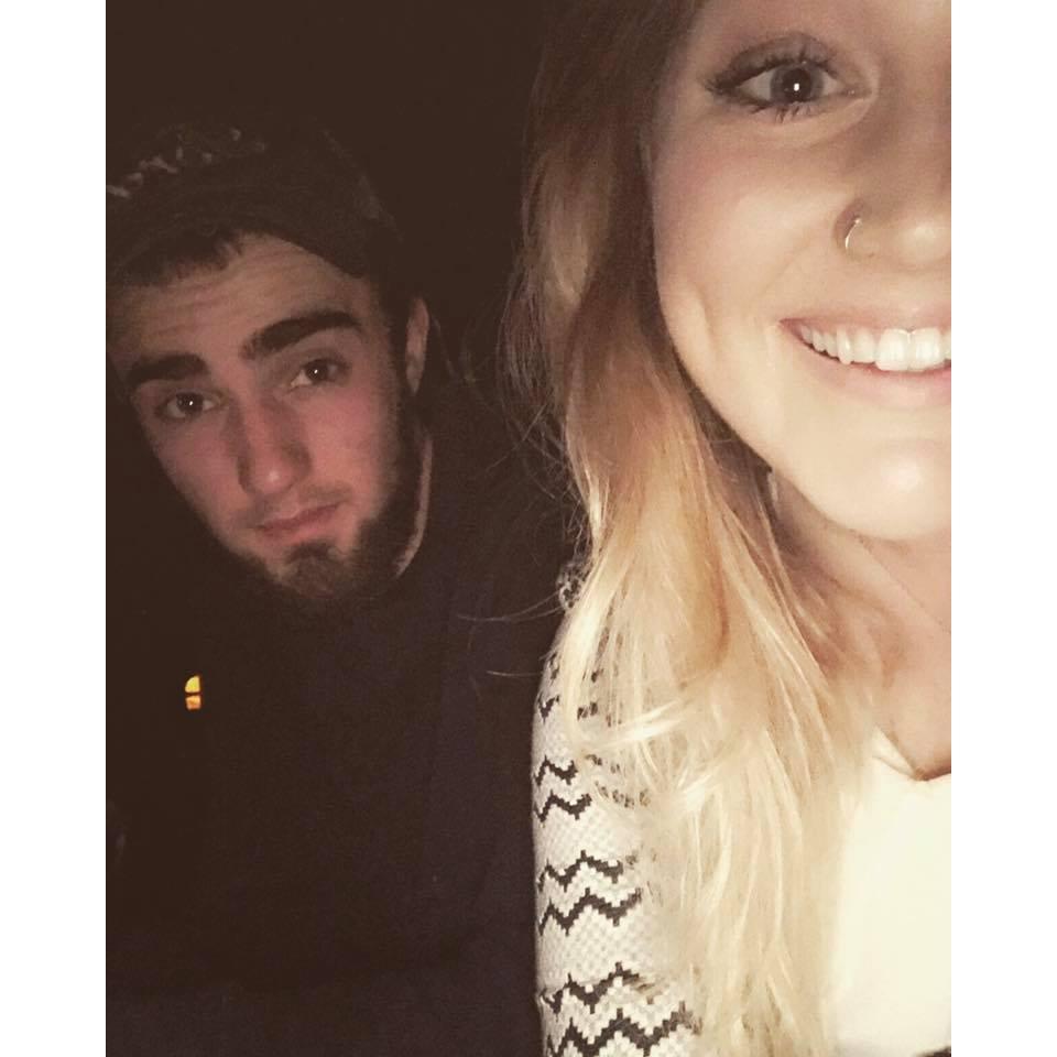 This is one of our first pictures together, gathered around a fire.