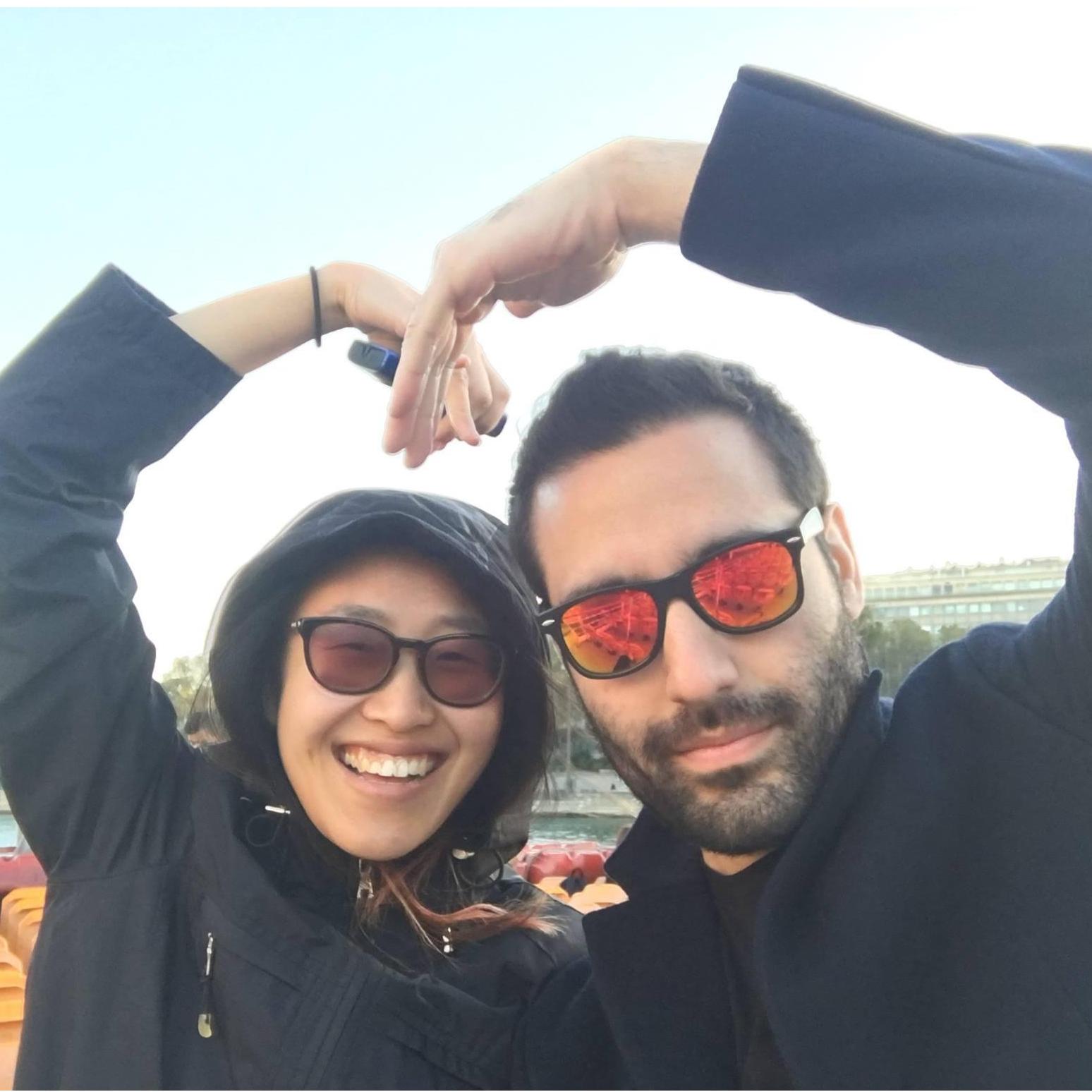 Making an awkward heart on the Bateaux Mouches in Paris.