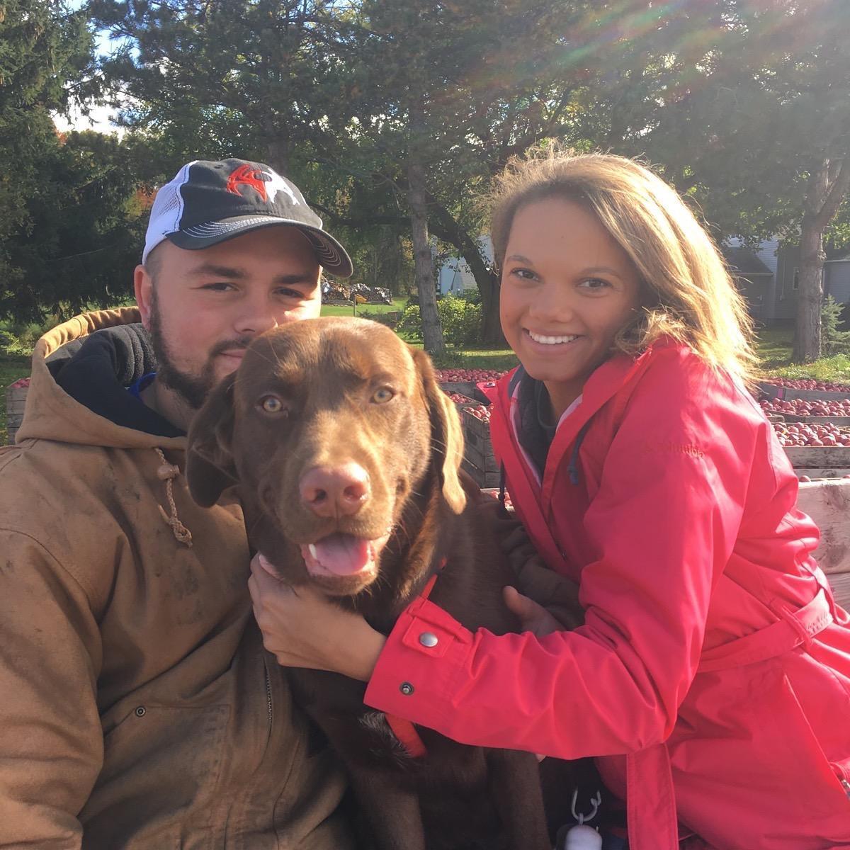 Crazy dog parents at the apple orchard