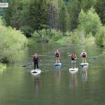 Stand Up Paddle Boarding or White Water Rafting