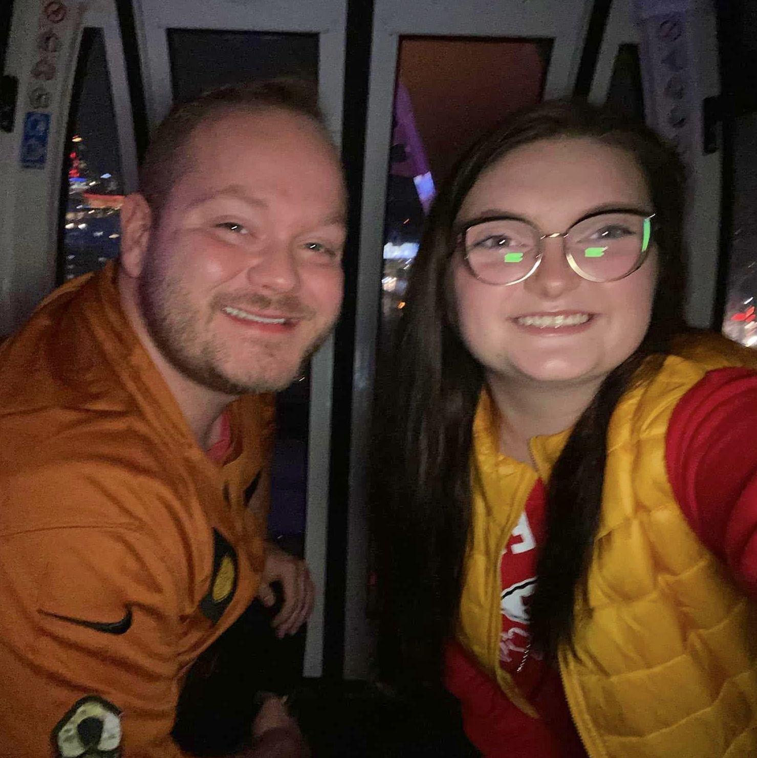 On the sky wheel in KC! Fun fact: Dustin was going to propose here but Sara had a panic attack because she is afraid of heights and Ferris wheels.