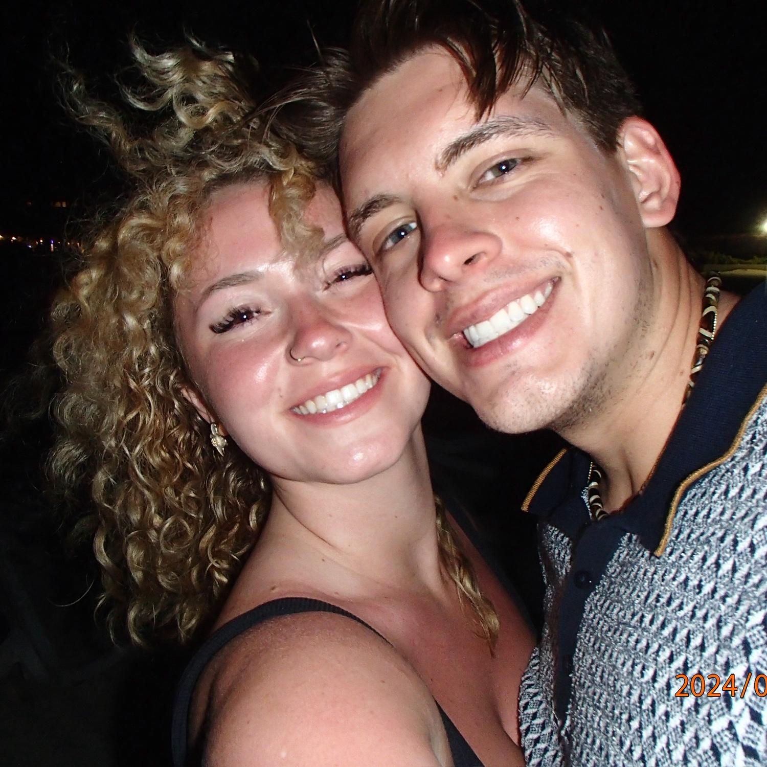 Us in the Bahamas taking pictures on the beach at night