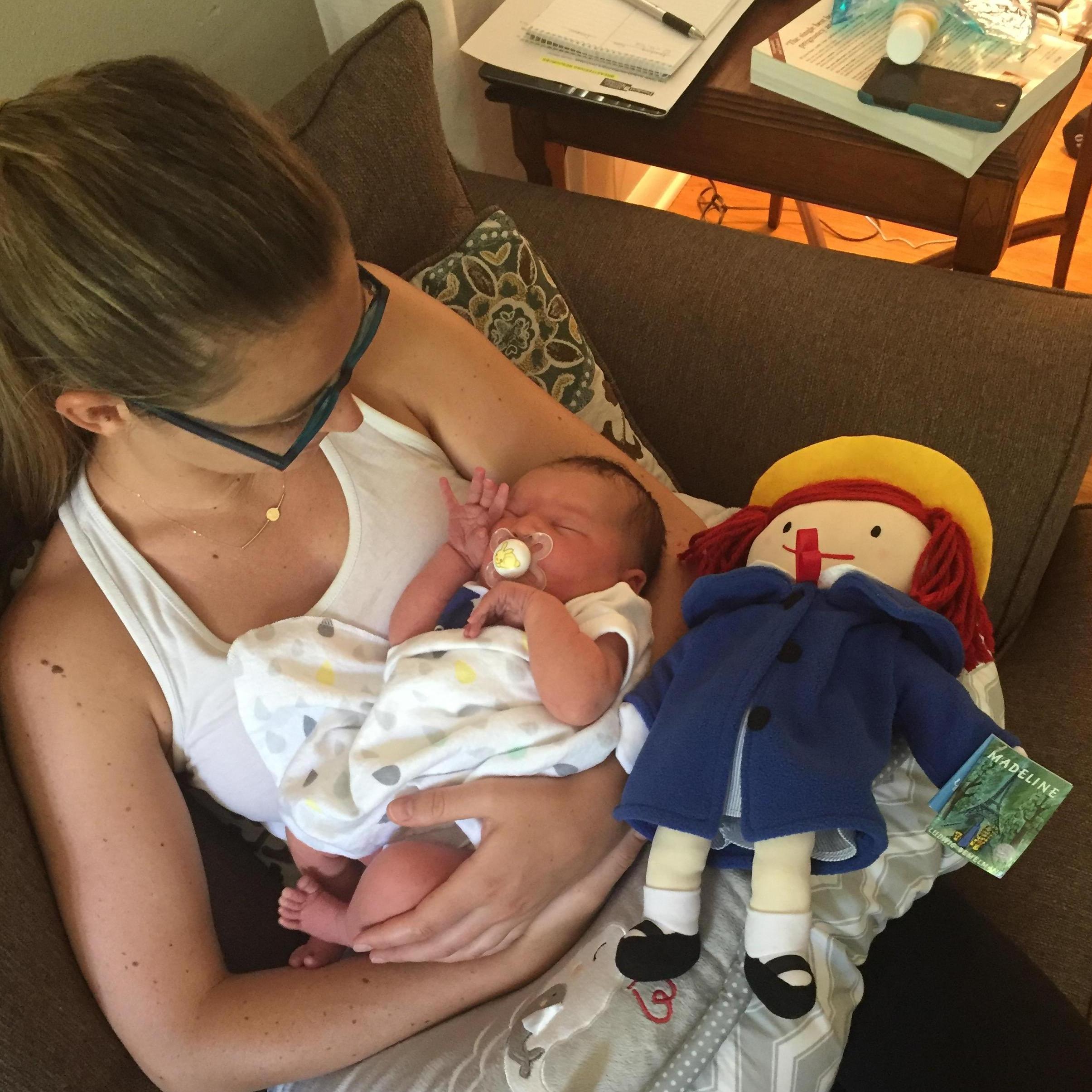 Aunt Caroline meets Madeline at day two of life!