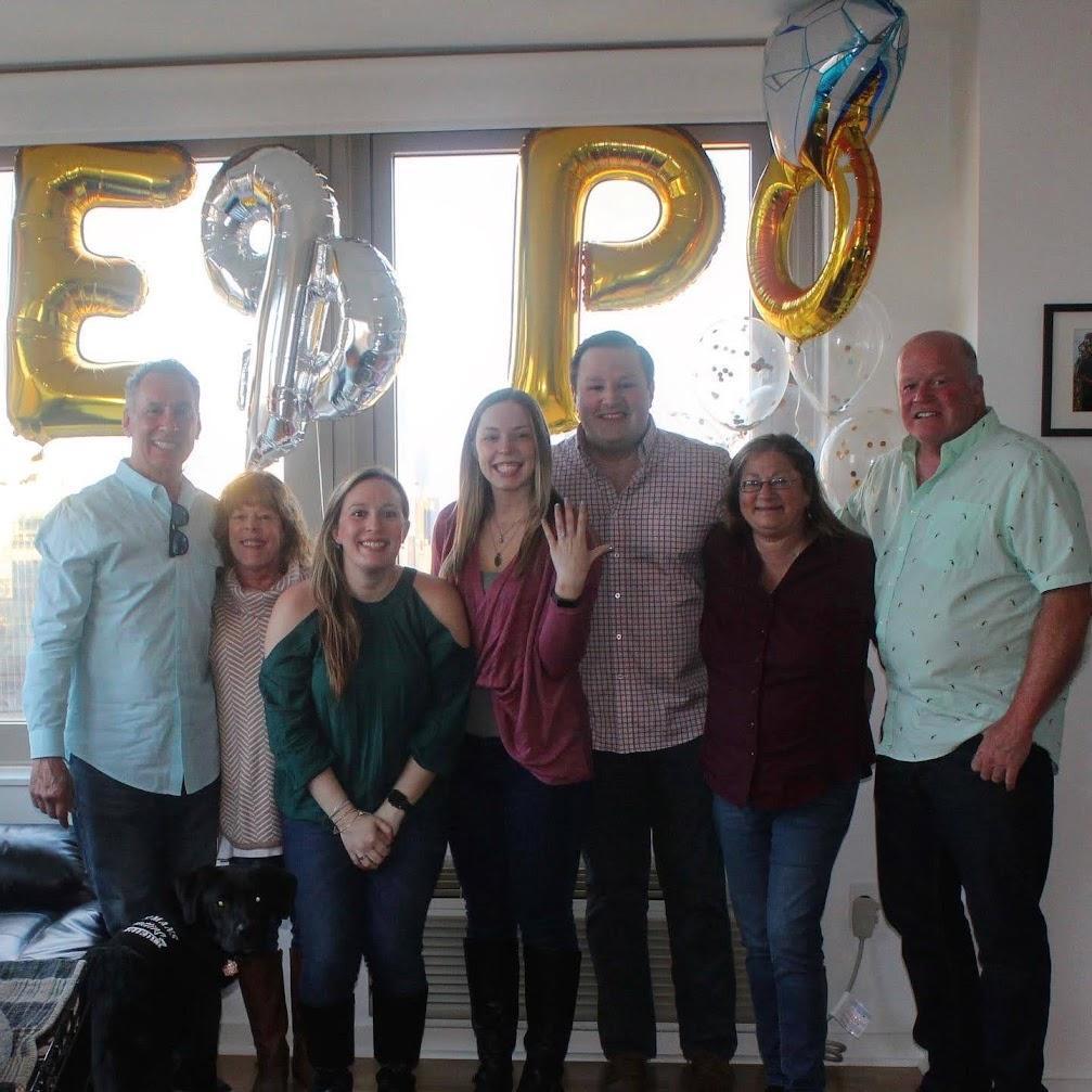 Our families surprised Erin after Pat proposed! They were hiding in our apartment in JC!