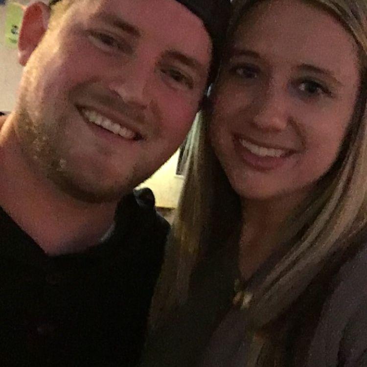 Our first picture together! Looks like it was taken on a Nokia flip phone lol.
