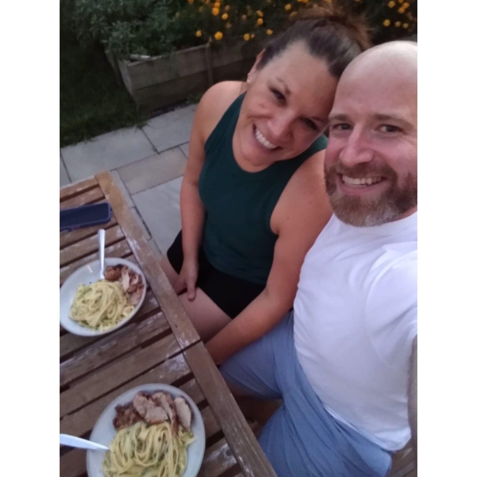 Enjoying homecooked delicious food in a friend's backyard