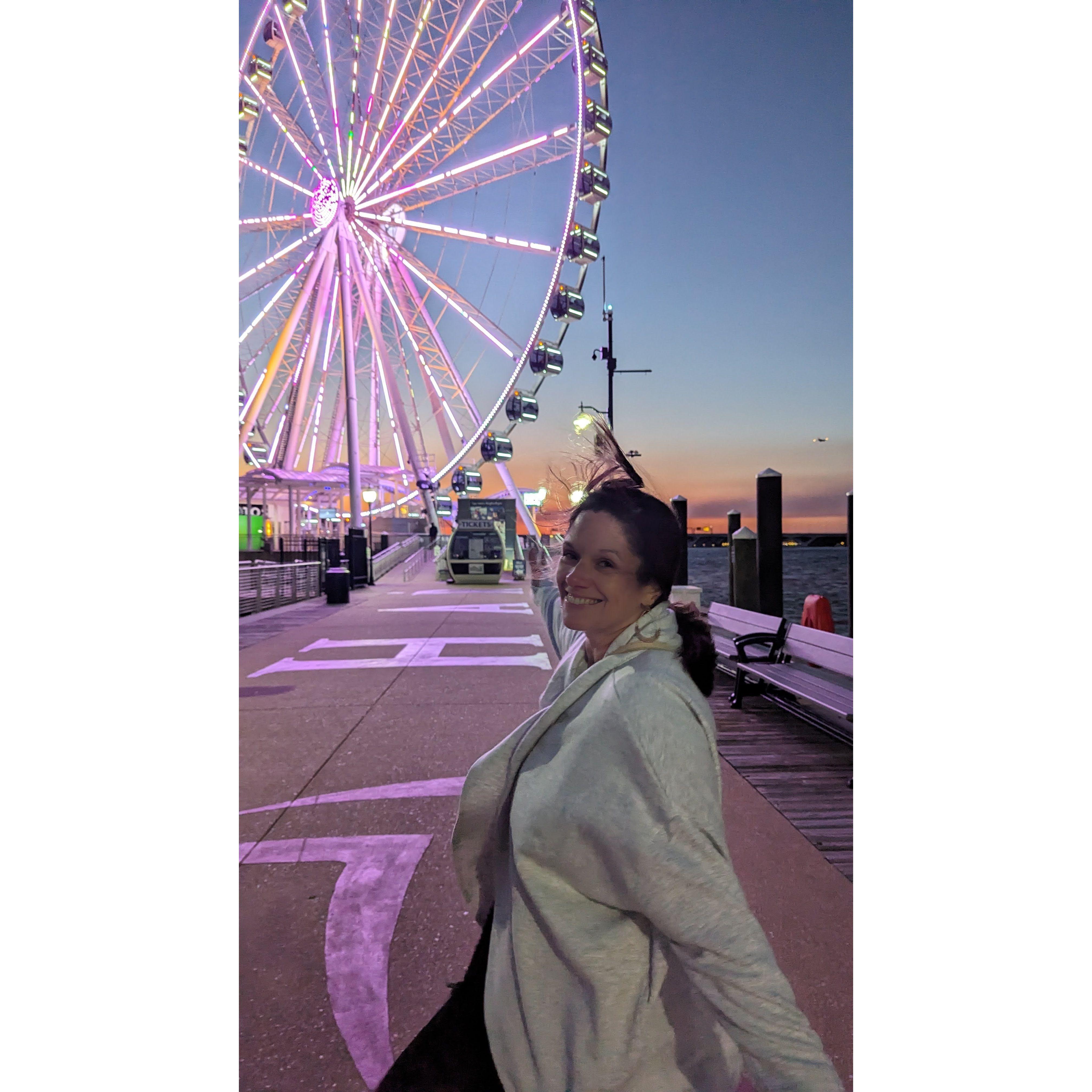 On the way to the Ferris Wheel at National Harbor, Gene proposed on the top of the Ferris Wheel.