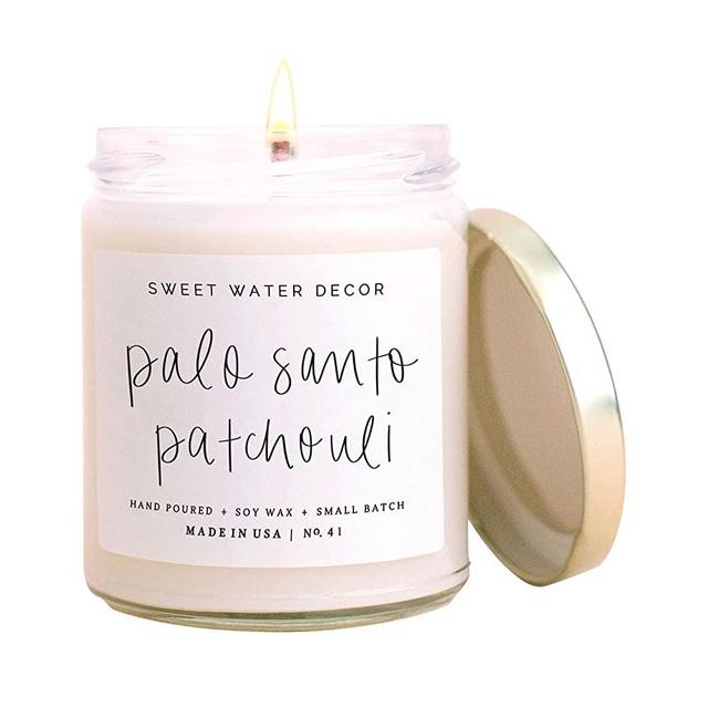 Sweet Water Decor Palo Santo Patchouli Candle | Black Pepper, Clove, Lavender, Cedarwood Scented Soy Wax Candle for Home | Gifts for Women, Men, Housewarming | 9oz Clear Glass Jar, 40 Hour Burn Time
