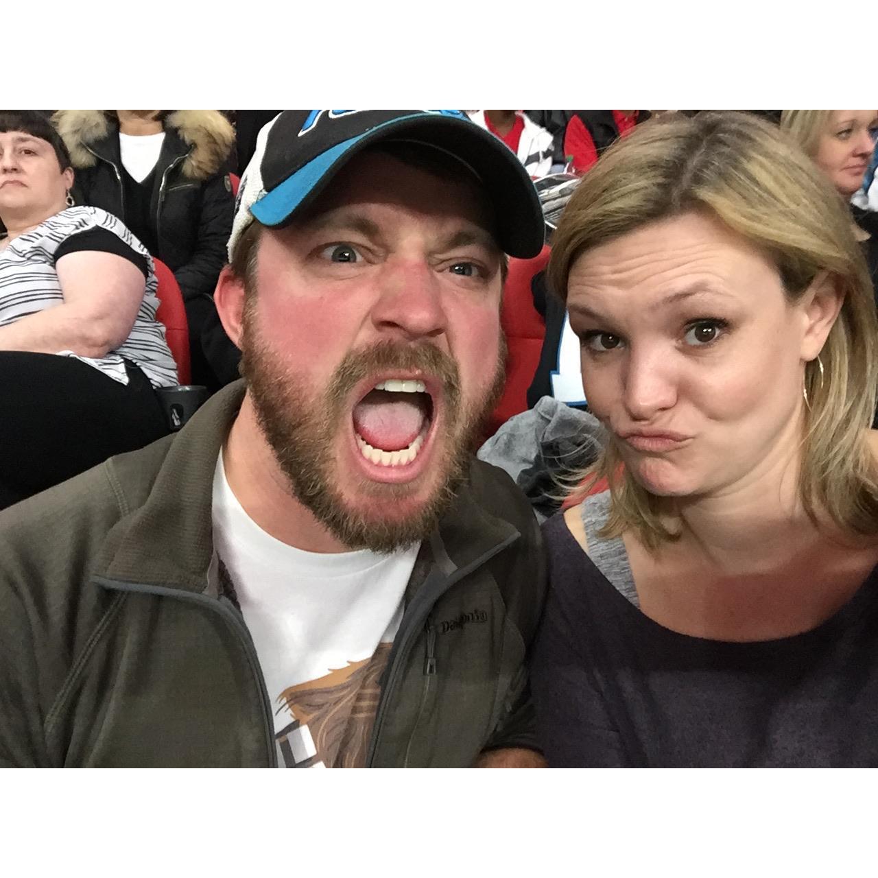 When you surprise him with tickets to the Panthers Falcons game at the new stadium in Atlanta over New Years and every picture consists of him doing the Panther's Growl very loudly...