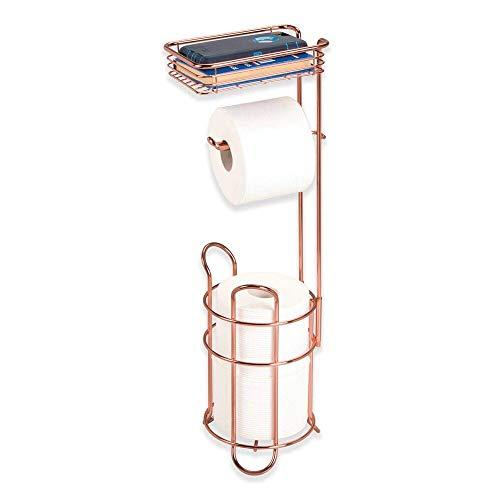 mDesign Freestanding Metal Wire Toilet Paper Roll Holder Stand and Dispenser with Storage Shelf for Cell, Mobile Phone - Bathroom Storage Organization - Holds 3 Mega Rolls - Rose Gold