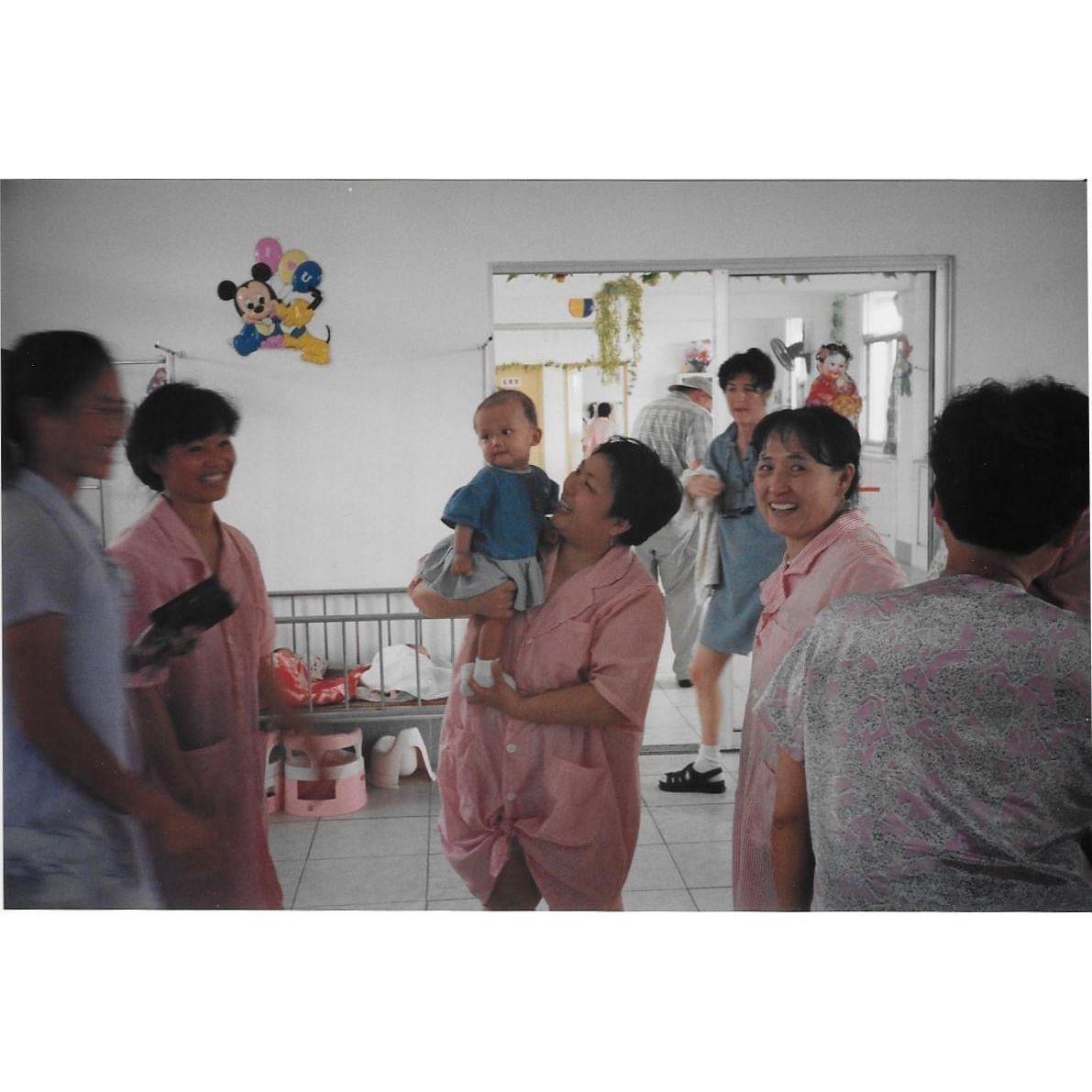 1999: Baby Glory in her orphanage in China