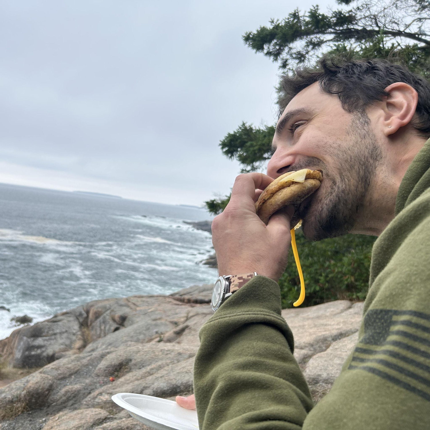Eating egg sandwiches on a cliff in Acadia National Park