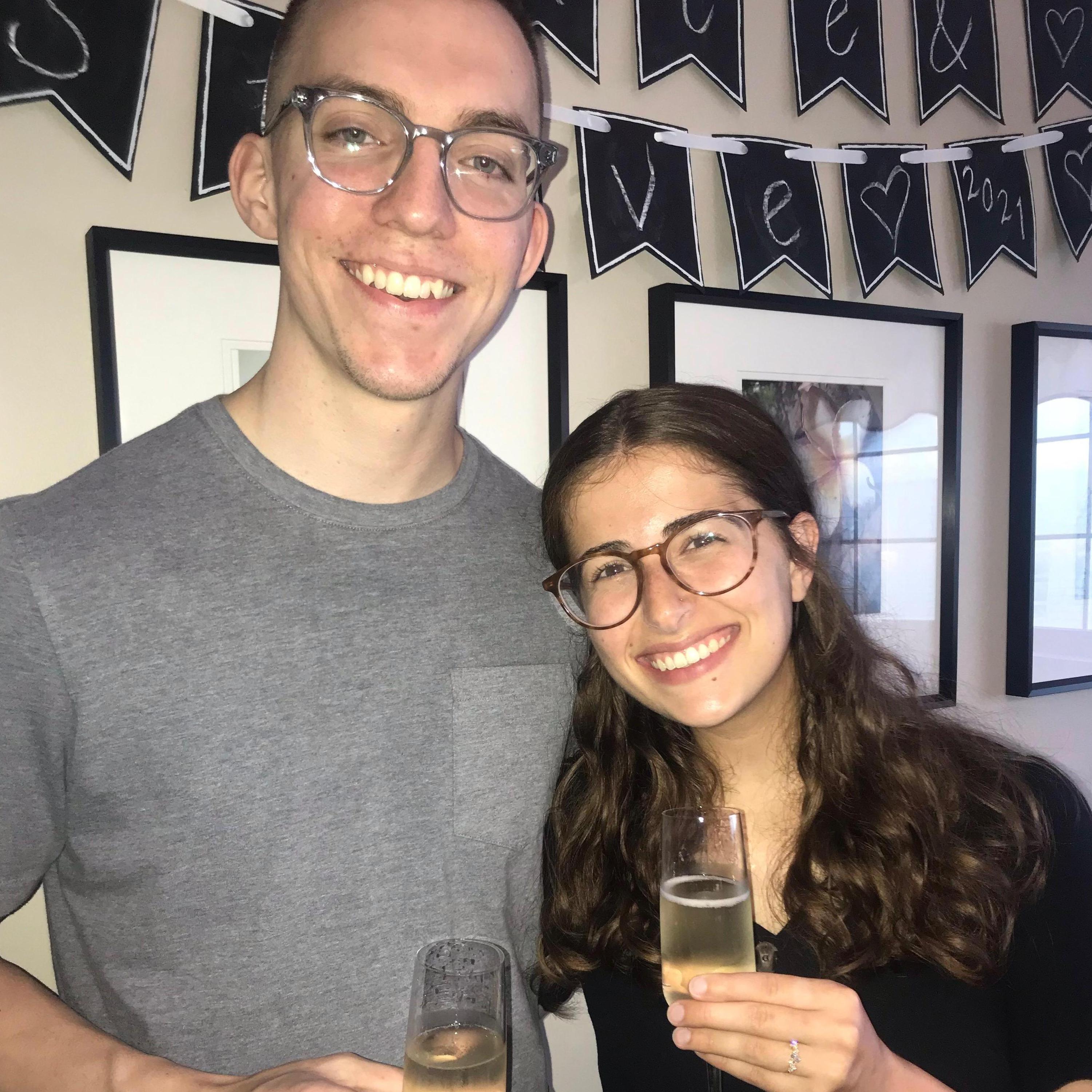 celebrating our engagement with a toast!