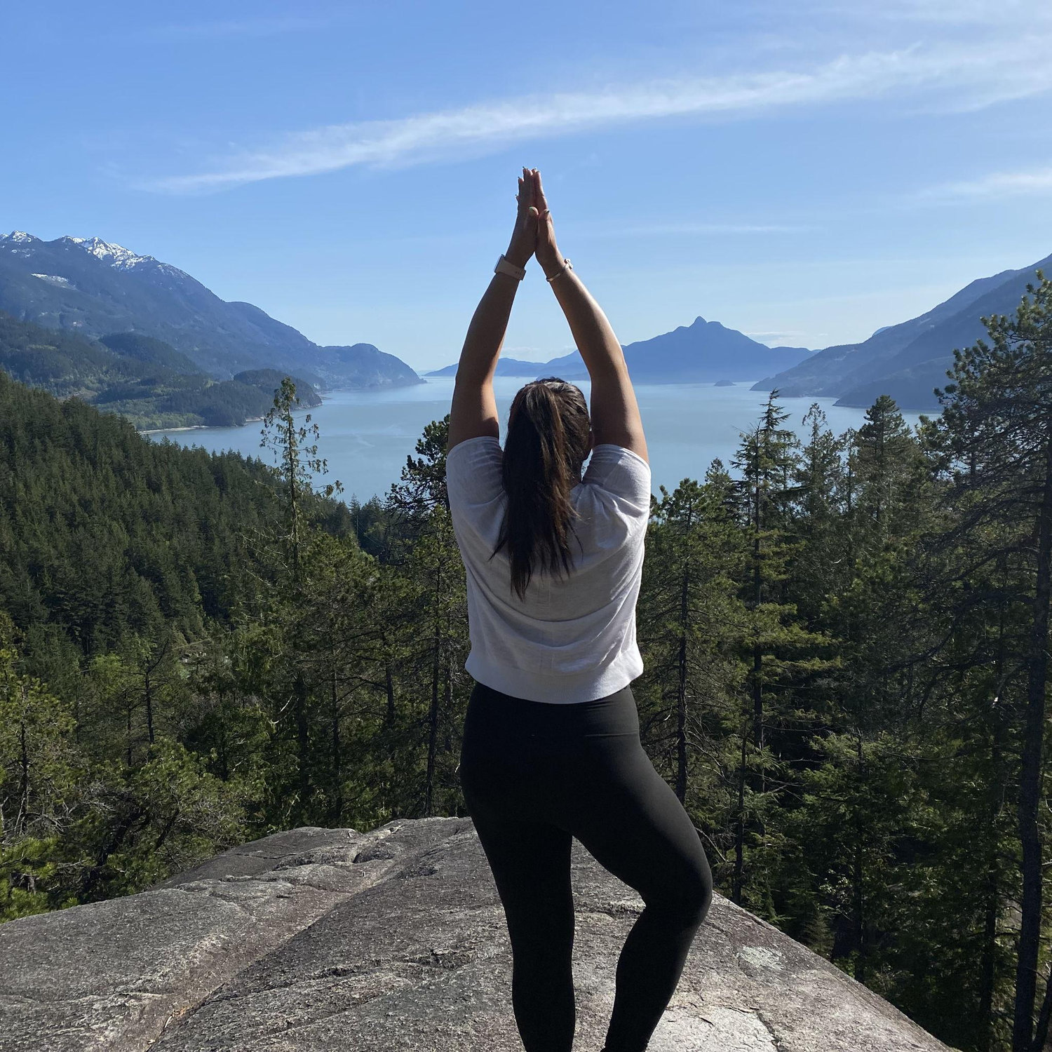 Fun fact: Tiff strikes a yoga pose on every beach, mountain, tree or rock she climbs!