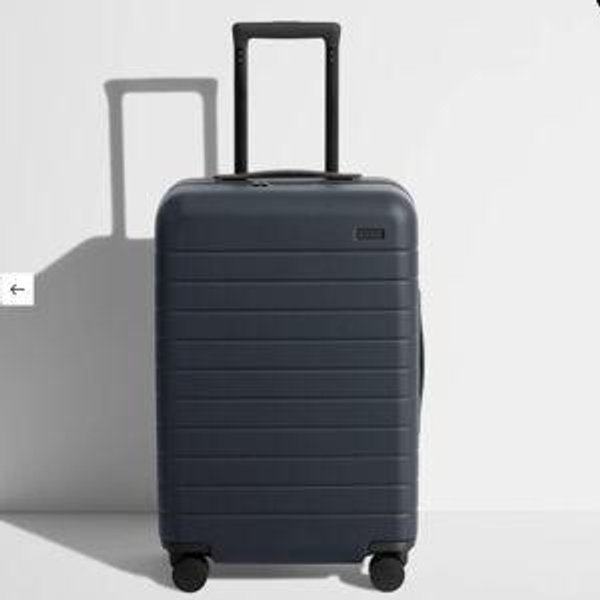 The Away Bigger Carry-On Flex in Navy