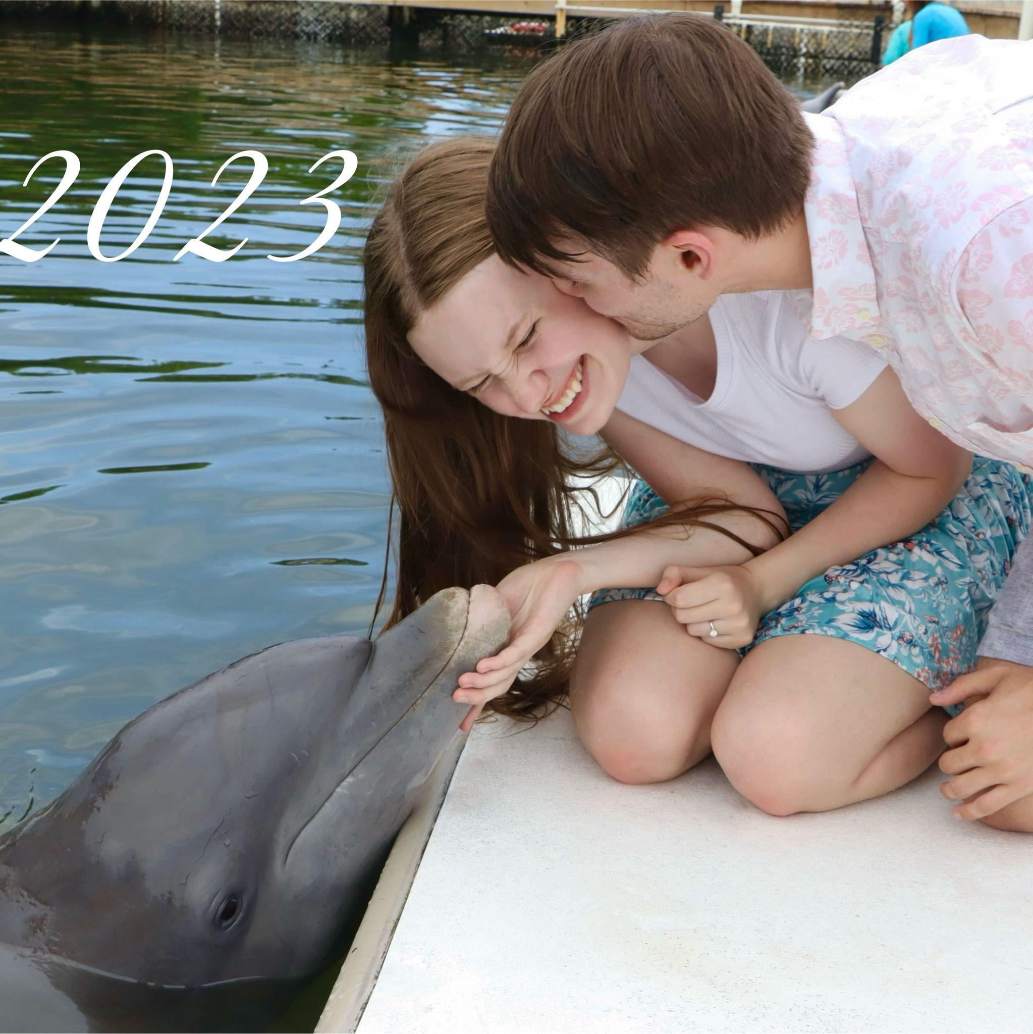 After Tori's college graduation, we took a trip to the place it all started. Ethan proposed, and we had to celebrate with the dolphins who introduced us.