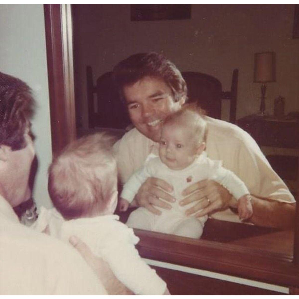 Brenda, a mirror, and her Dad