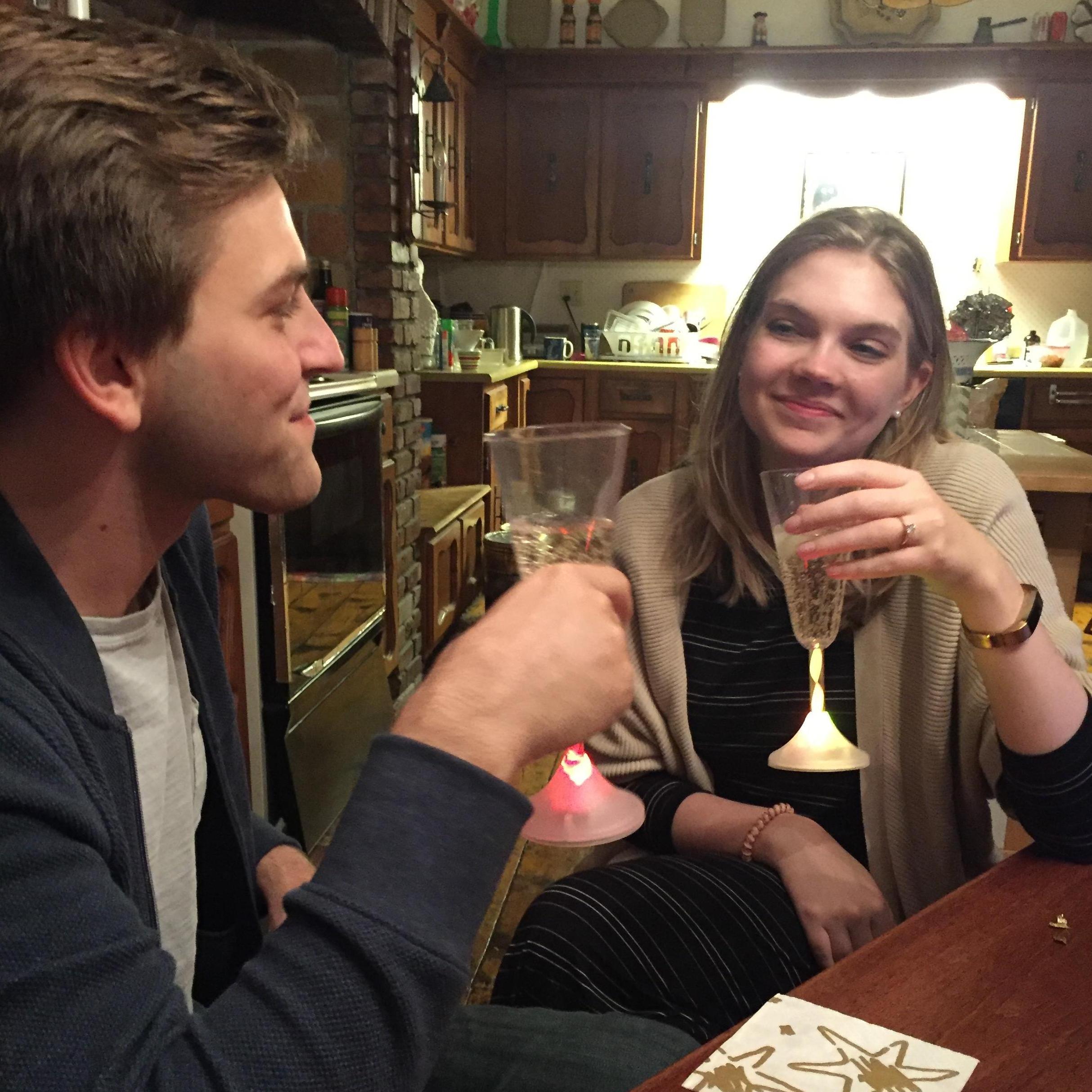Toasting each other with sparking cider to celebrate the engagement!