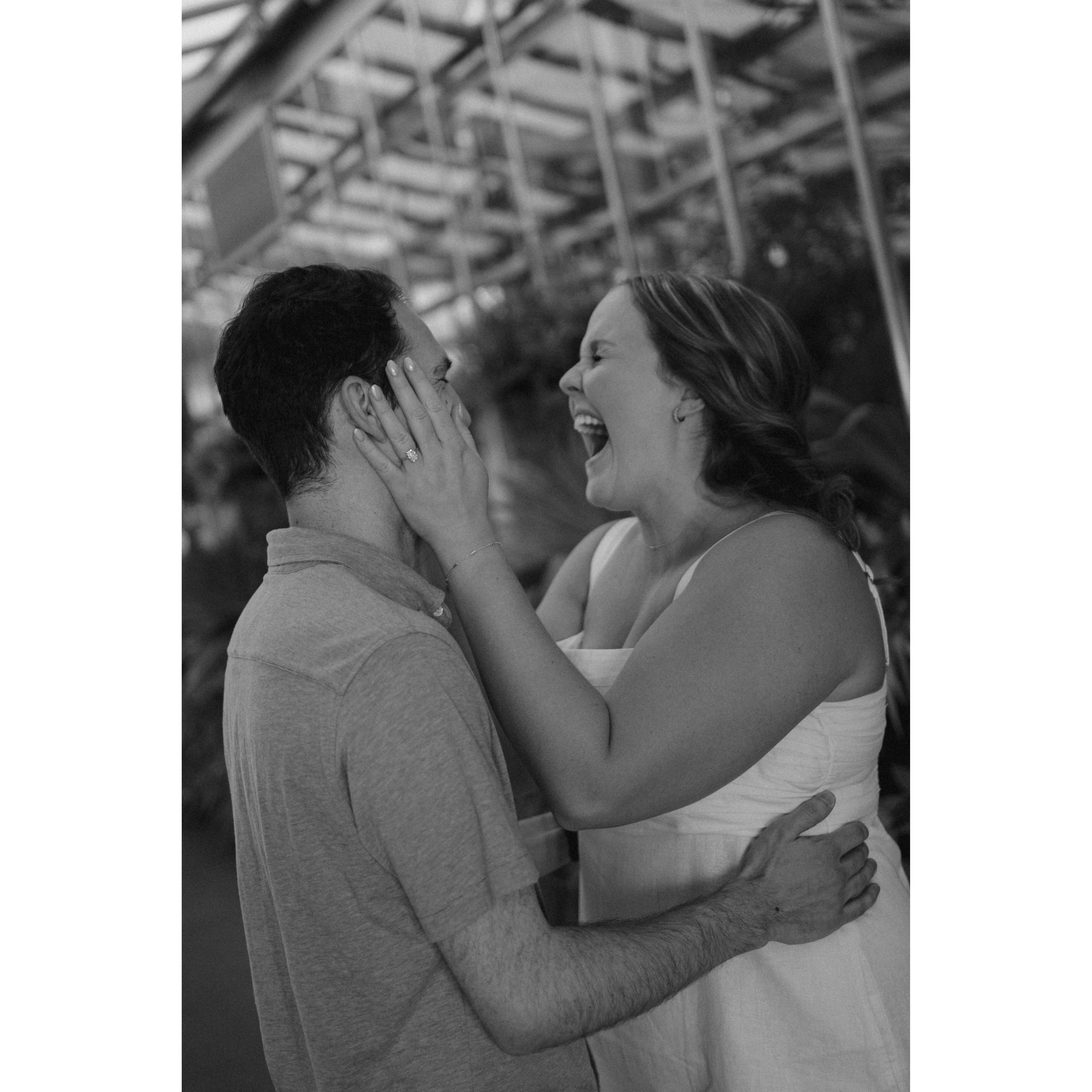 One of the pics right after we got engaged when our photographer told us to "show me how you feel!"