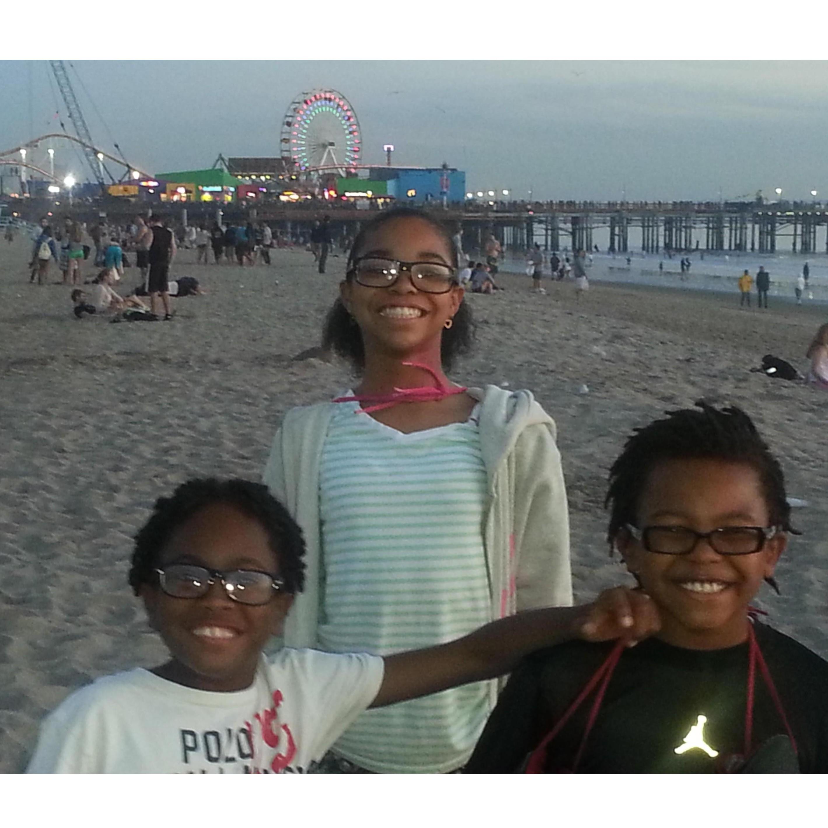 The boys, and Cici...at the beach in Santa Monica. (2014)