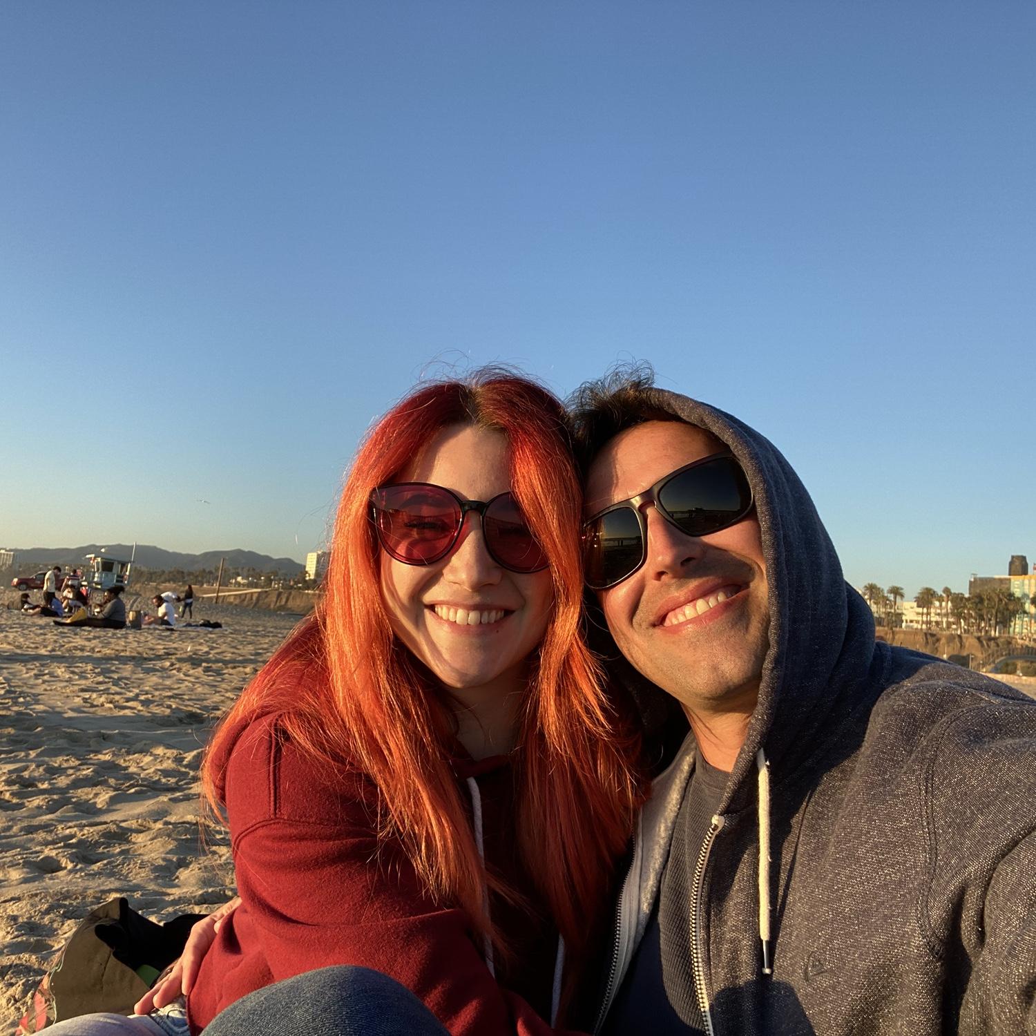 This photo was taken on Shaun and Candice's first date! A picnic on the beach with pizza and a walk on the pier.