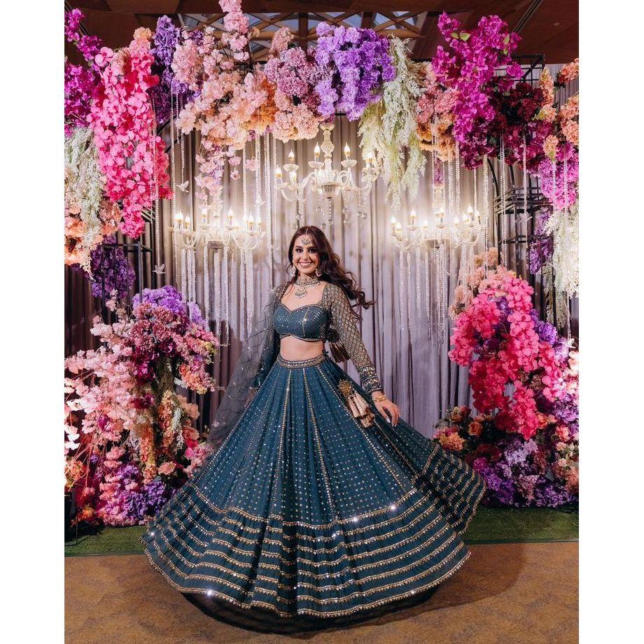 This lehenga set can worn on Sangeet Night (something Blingy and shimmery)