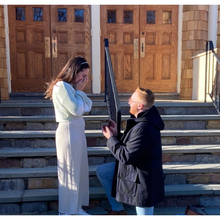Tim proposing in front of The First Presbyterian Church in Cranford!