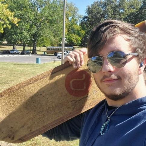 Jonah trying to impress Alexis with a longboard - 2022